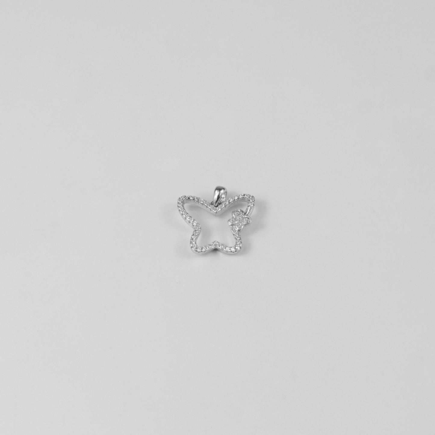 GETTHEJUICE-925STERLINGSILVER-Moonlit Flutter Necklace: A sterling silver necklace featuring a delicate butterfly charm with a moonlit glow, exuding elegance and grace.