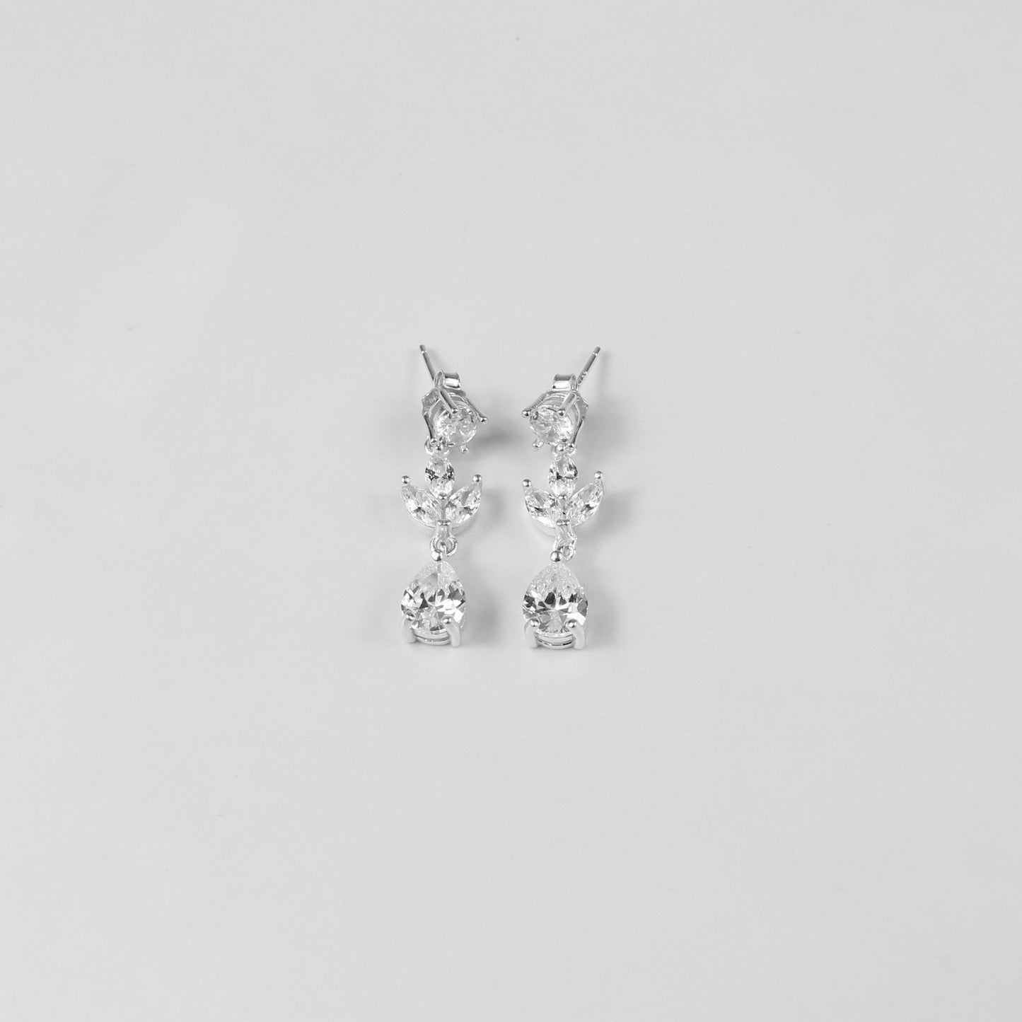 An elegant necklace named 'Moonlit Grace,' crafted from 925 sterling silver. Its design captures the serene beauty of moonlight with a graceful and timeless aesthetic.