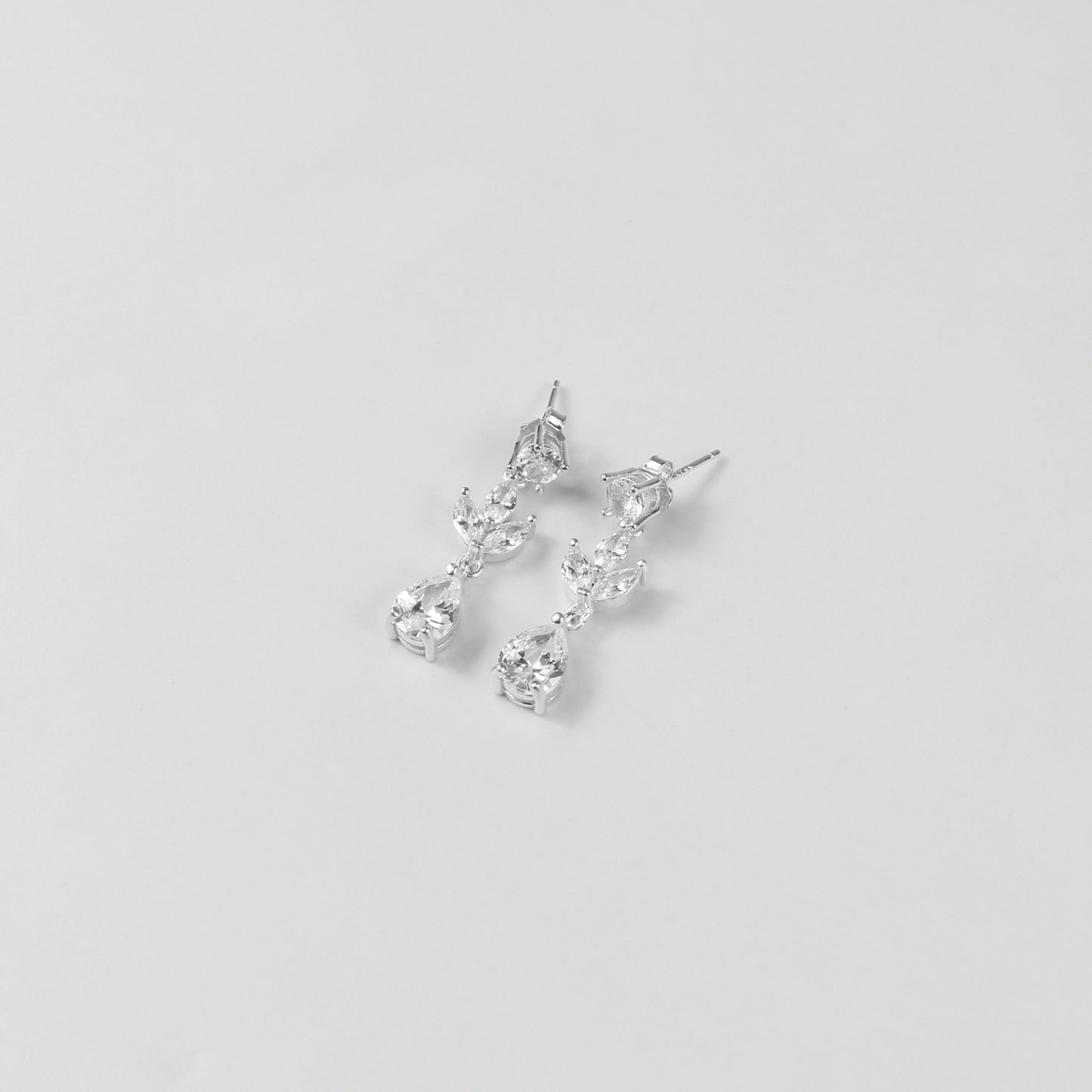 An elegant necklace named 'Moonlit Grace,' crafted from 925 sterling silver. Its design captures the serene beauty of moonlight with a graceful and timeless aesthetic.