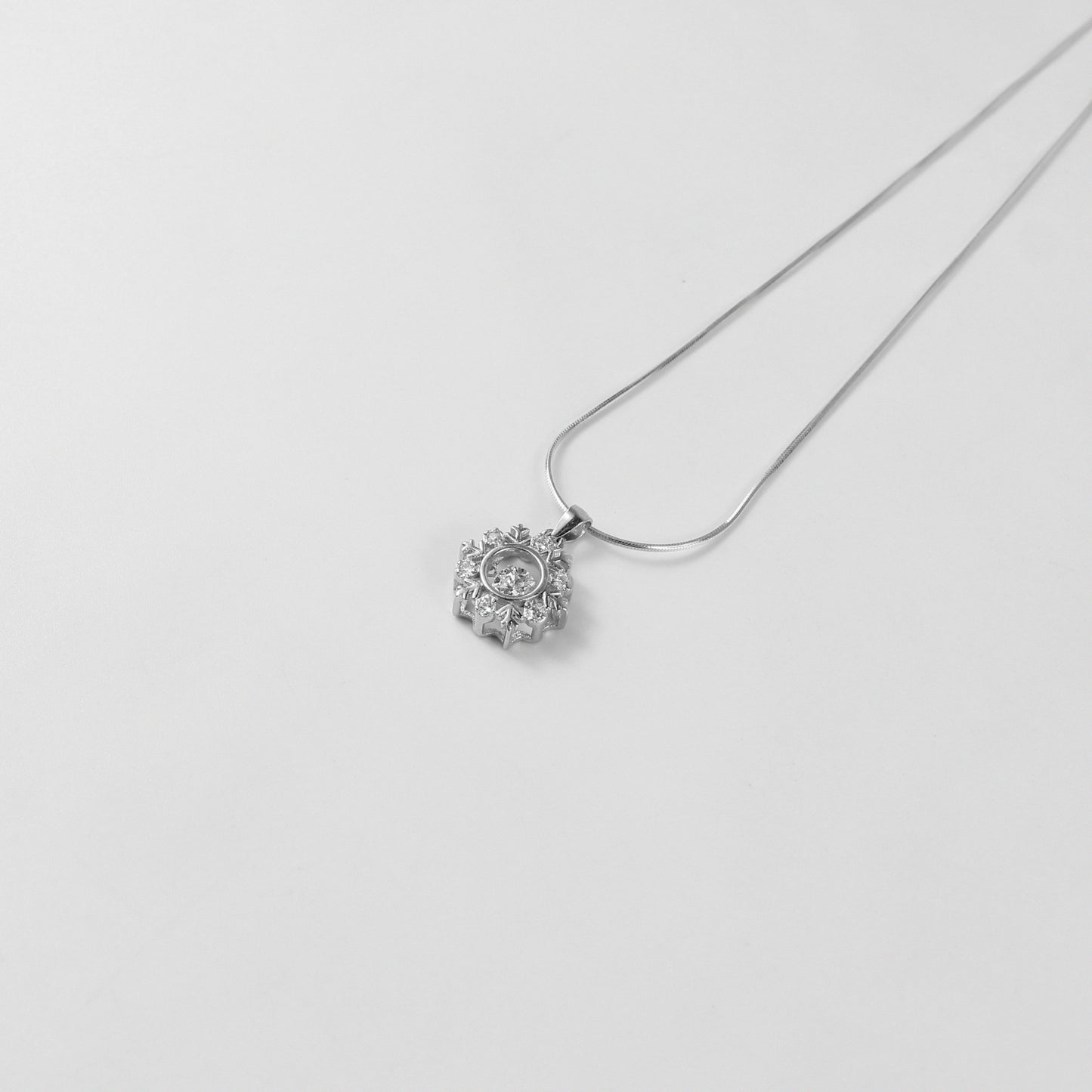 A captivating necklace named 'Opalina,' crafted from 925 sterling silver. Its design highlights the enchanting allure of opalescent hues, radiating elegance and charm.
