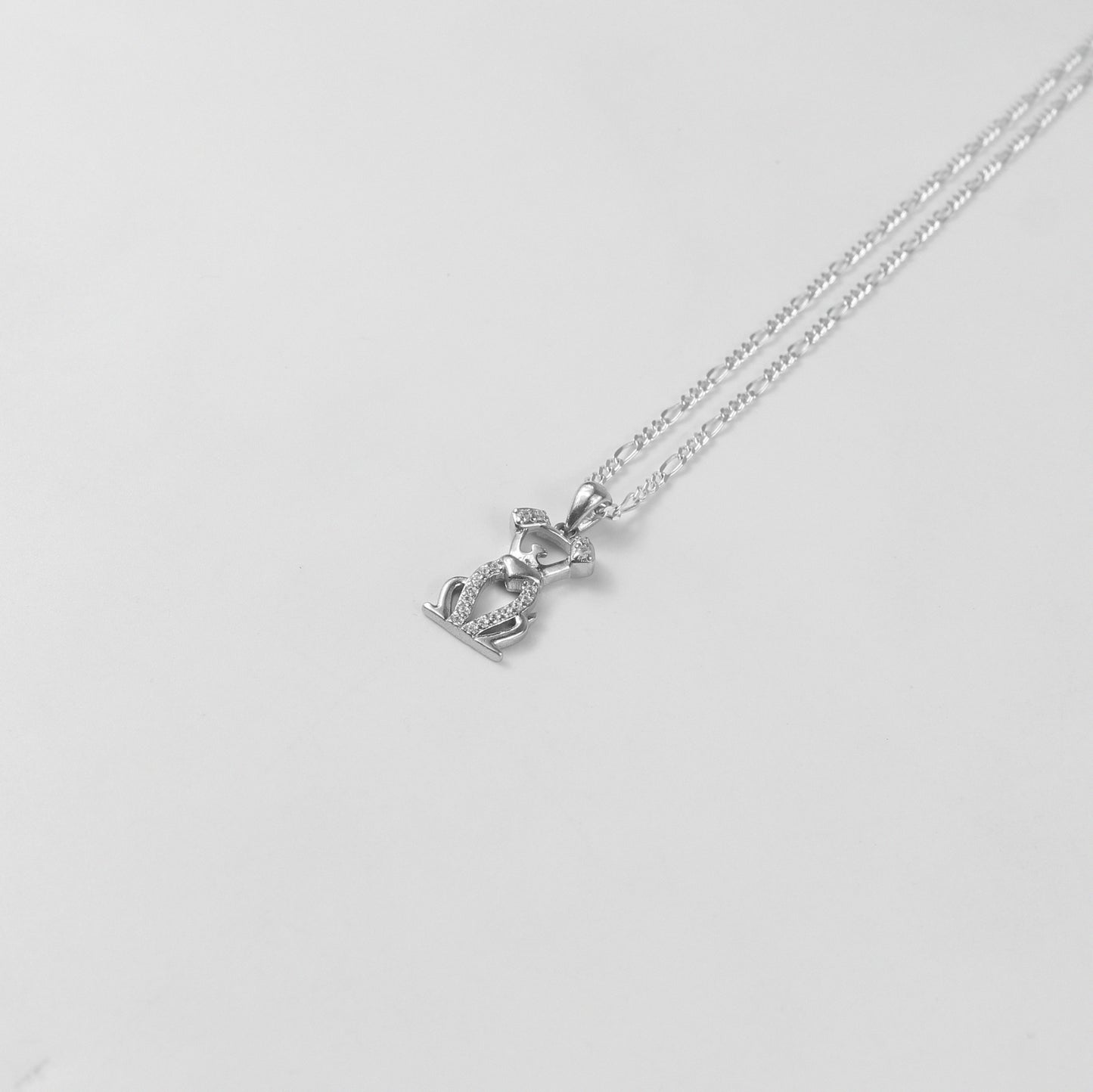 A delightful necklace named 'Puppy Sparkle,' crafted from 925 sterling silver. Its design captures the playful essence of a puppy's spirit, enhanced with dazzling details for a fun and elegant touch.