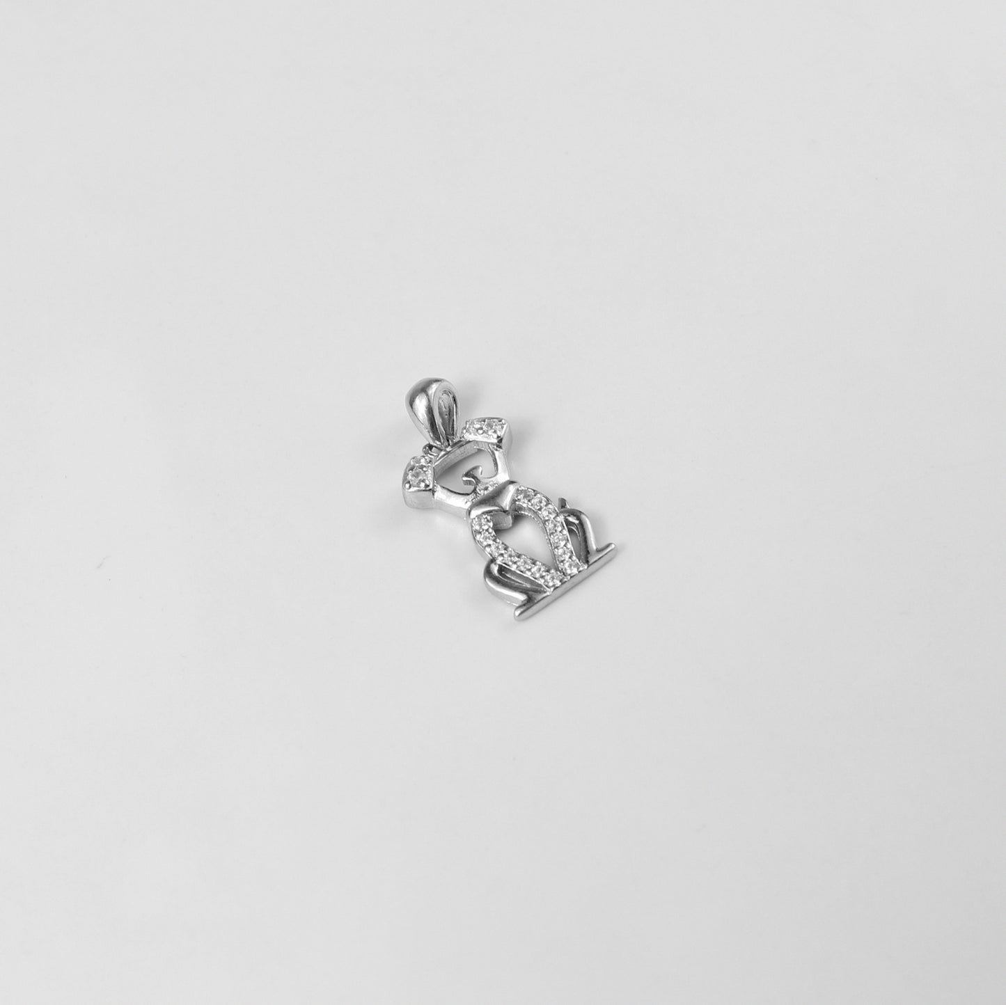 A delightful necklace named 'Puppy Sparkle,' crafted from 925 sterling silver. Its design captures the playful essence of a puppy's spirit, enhanced with dazzling details for a fun and elegant touch.