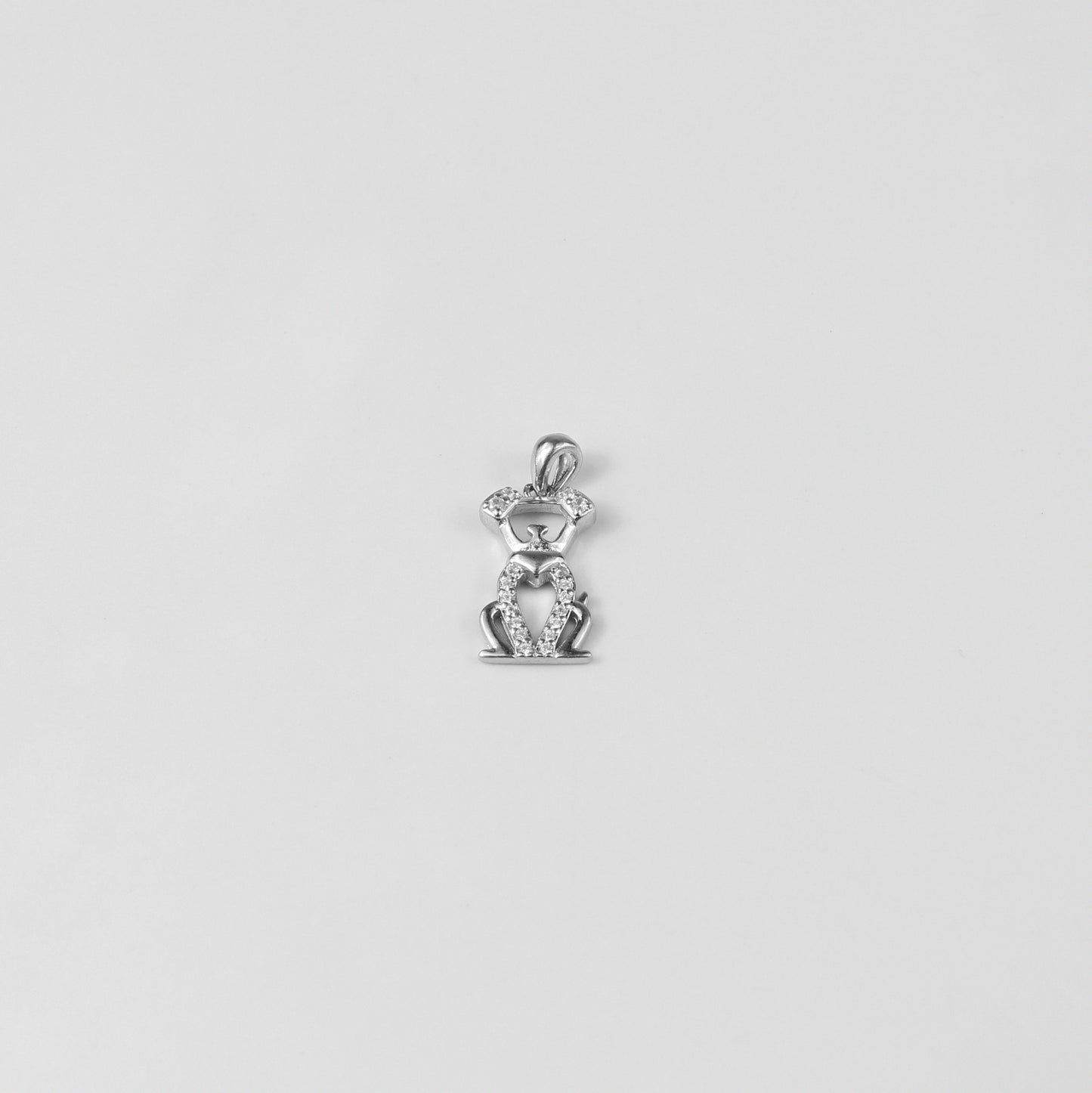 A delightful necklace named 'Puppy Sparkle,' crafted from 925 sterling silver. Its design captures the playful essence of a puppy's spirit, enhanced with dazzling details for a fun and elegant touch.