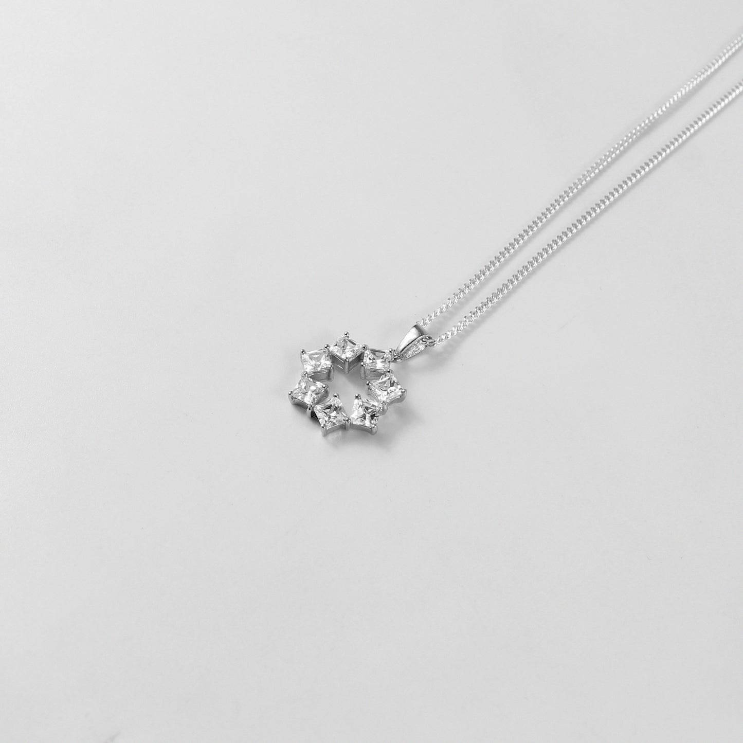 GETTHEJUICE-925STERLINGSILVER-Pure Glimmer Necklace: A sterling silver necklace radiating a subtle yet striking glow, designed to capture a sense of pure elegance and sophistication.