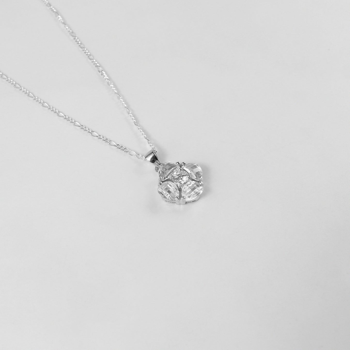 A graceful necklace named 'Purellia,' crafted from 925 sterling silver. Its design exudes purity and sophistication, featuring delicate details that embody timeless elegance.