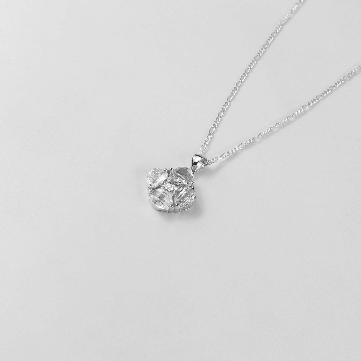 A graceful necklace named 'Purellia,' crafted from 925 sterling silver. Its design exudes purity and sophistication, featuring delicate details that embody timeless elegance.