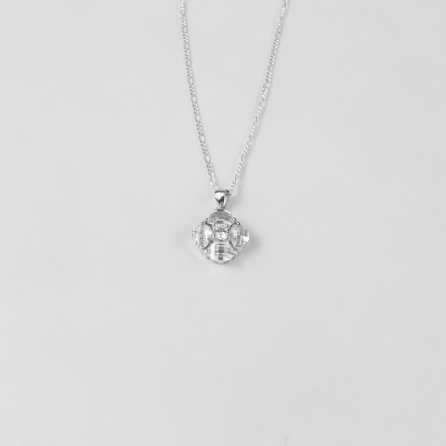 A graceful necklace named 'Purellia,' crafted from 925 sterling silver. Its design exudes purity and sophistication, featuring delicate details that embody timeless elegance.