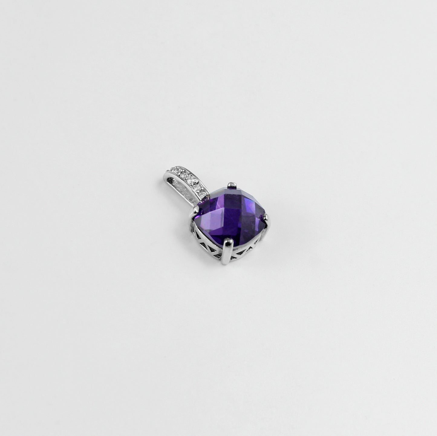 An elegant necklace named 'Purple Glow,' crafted from 925 sterling silver. Its design features radiant purple accents that emit a soft, luminous charm, perfect for adding a touch of sophistication.