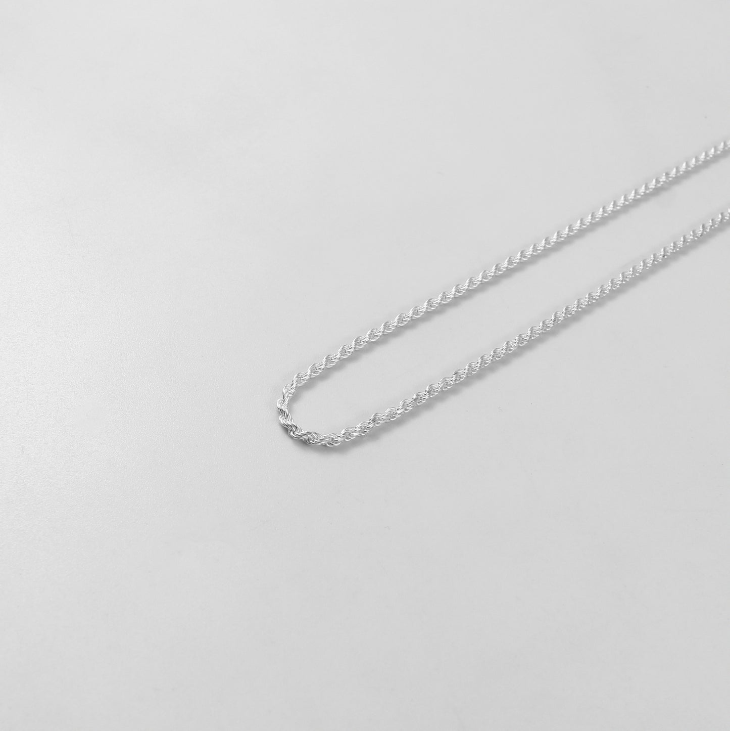 Rope Necklace - An elegant 925 sterling silver necklace by GetTheJuice, featuring a classic twisted rope design that brings timeless sophistication to any attire.