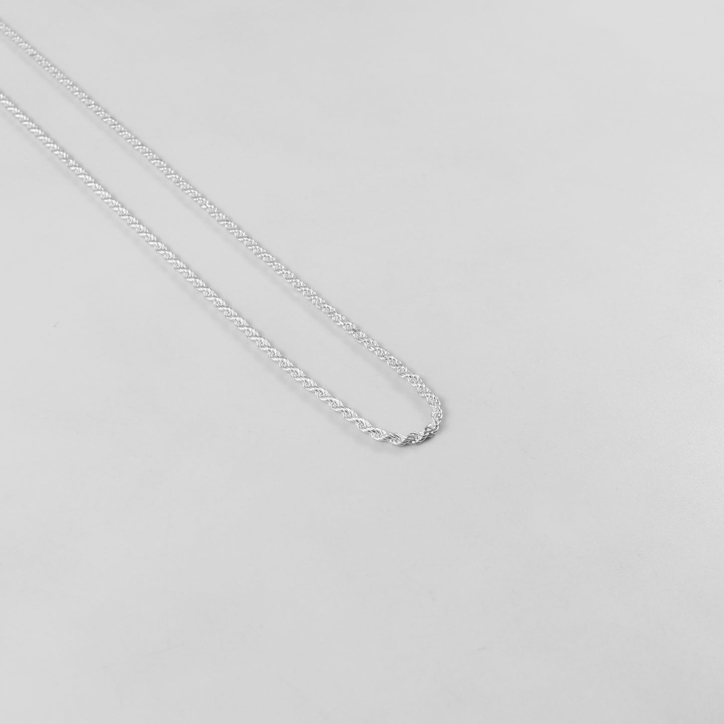 Rope Necklace - An elegant 925 sterling silver necklace by GetTheJuice, featuring a classic twisted rope design that brings timeless sophistication to any attire.