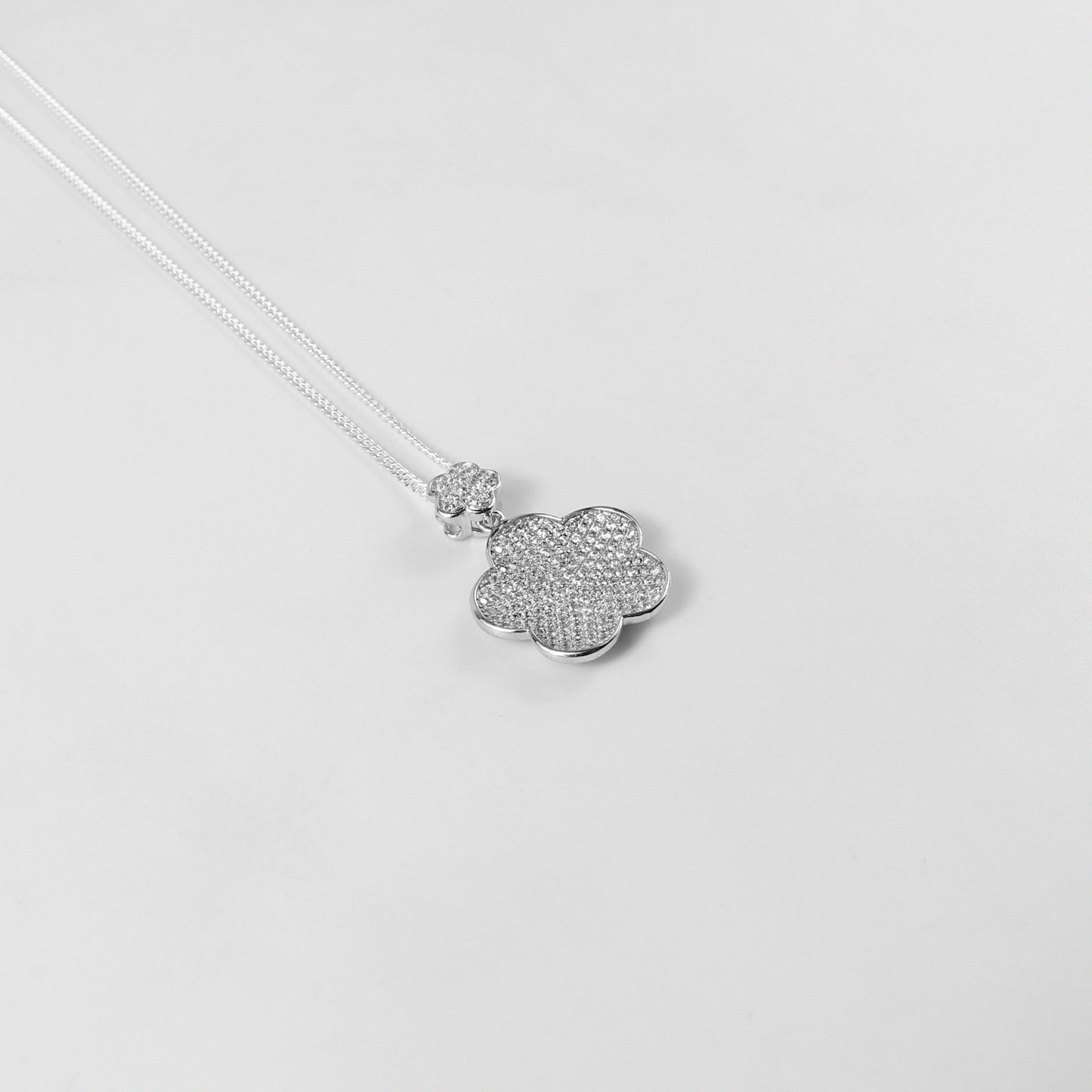 An ethereal necklace named 'Seraphic Gem,' crafted from 925 sterling silver. Its design features a celestial-inspired gem centerpiece, radiating divine elegance and timeless beauty.