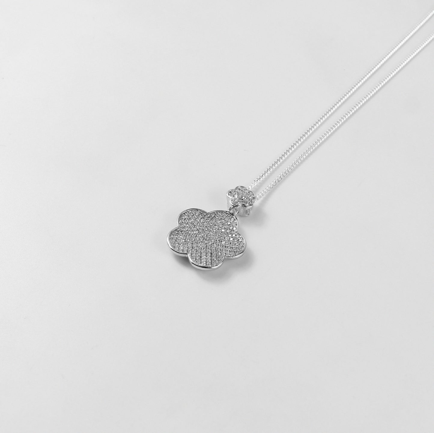 An ethereal necklace named 'Seraphic Gem,' crafted from 925 sterling silver. Its design features a celestial-inspired gem centerpiece, radiating divine elegance and timeless beauty.