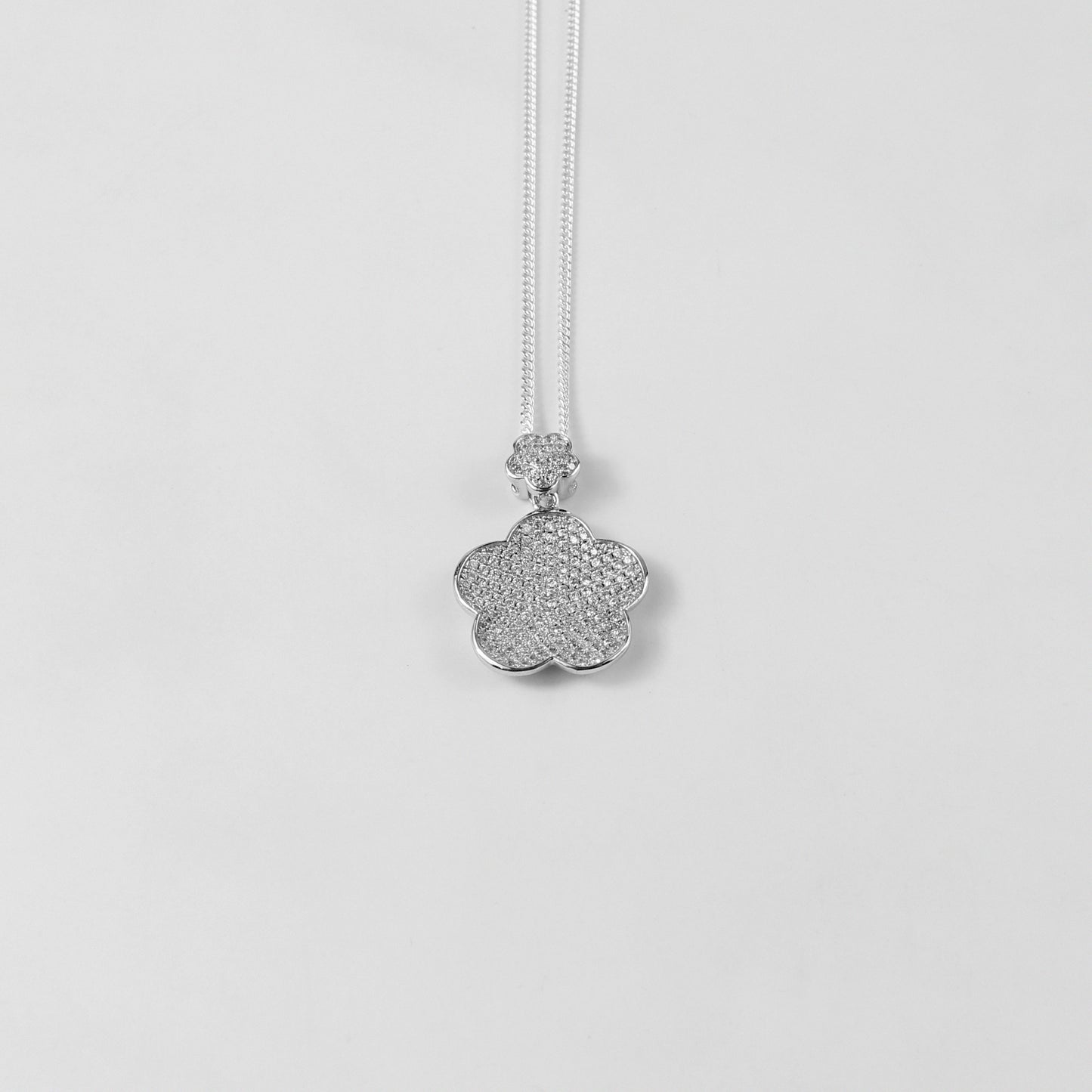 An ethereal necklace named 'Seraphic Gem,' crafted from 925 sterling silver. Its design features a celestial-inspired gem centerpiece, radiating divine elegance and timeless beauty.