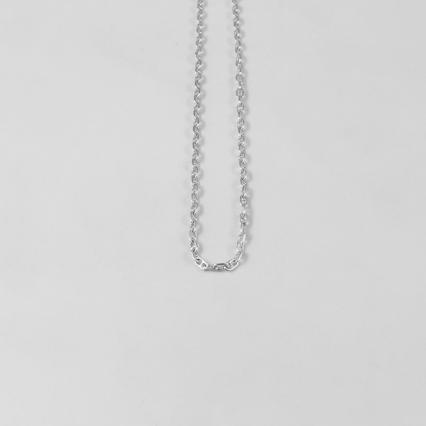 925 sterling silver necklace named 'Silver Lattice,' showcasing an intricate openwork design reminiscent of a delicate lattice pattern. Its elegant and airy craftsmanship exudes sophistication, making it a versatile and timeless accessory.