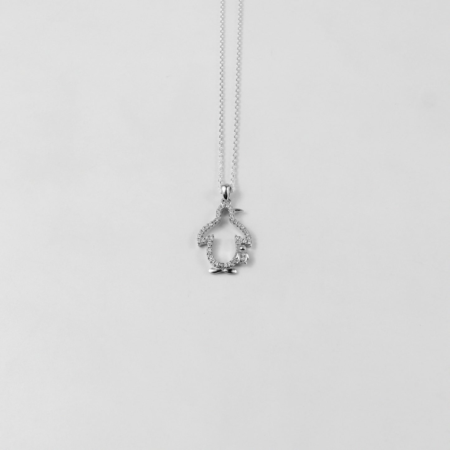 GETTHEJUICE-925STERLINGSILVER-Snowy Embrace Necklace: A sterling silver necklace radiating frosty charm, evoking the magic of winter’s gentle touch.