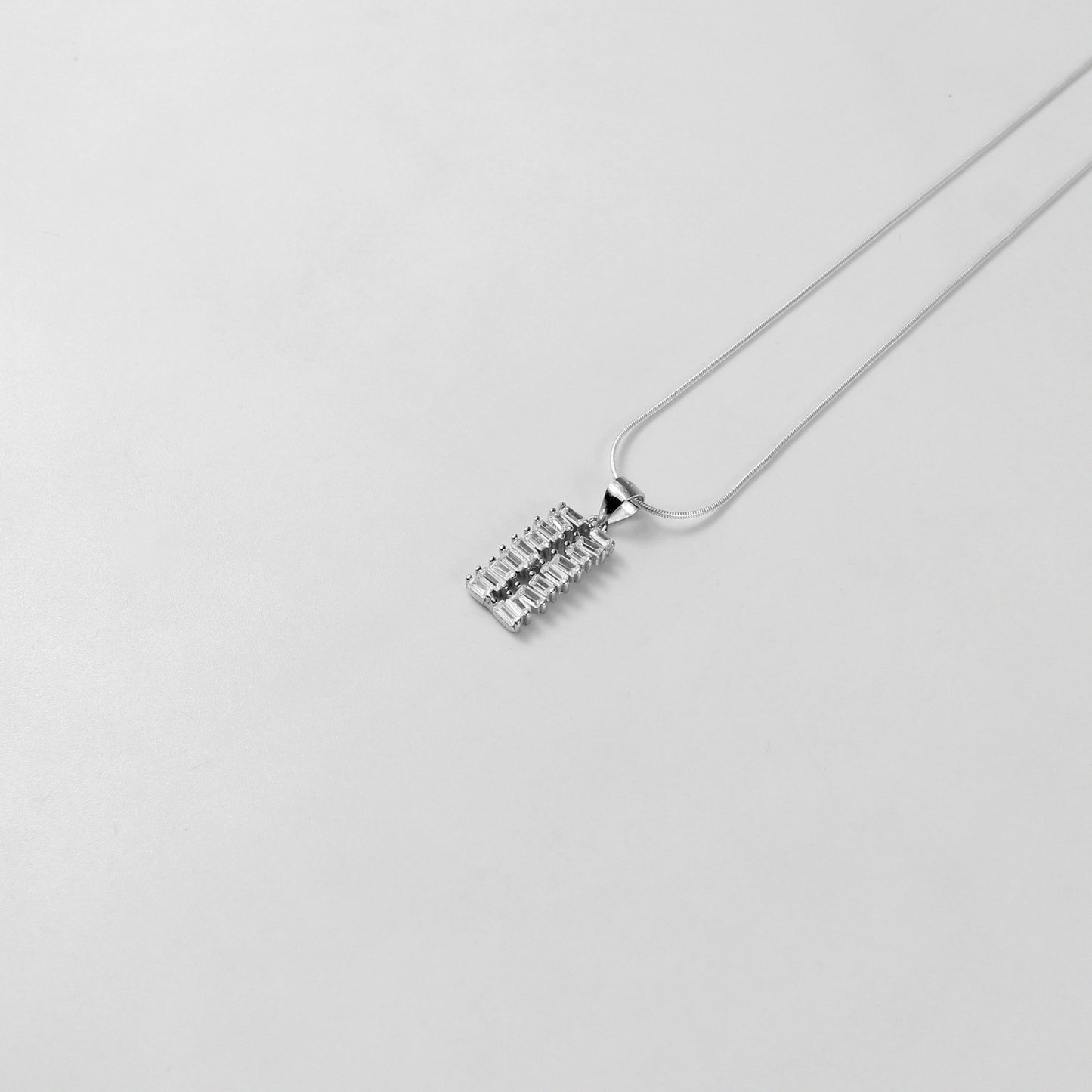 925 sterling silver necklace named 'Terra Luxe,' featuring a sophisticated design inspired by the rich elegance of natural elements. Its refined craftsmanship blends earthly textures with a modern luxurious aesthetic, making it a standout accessory.