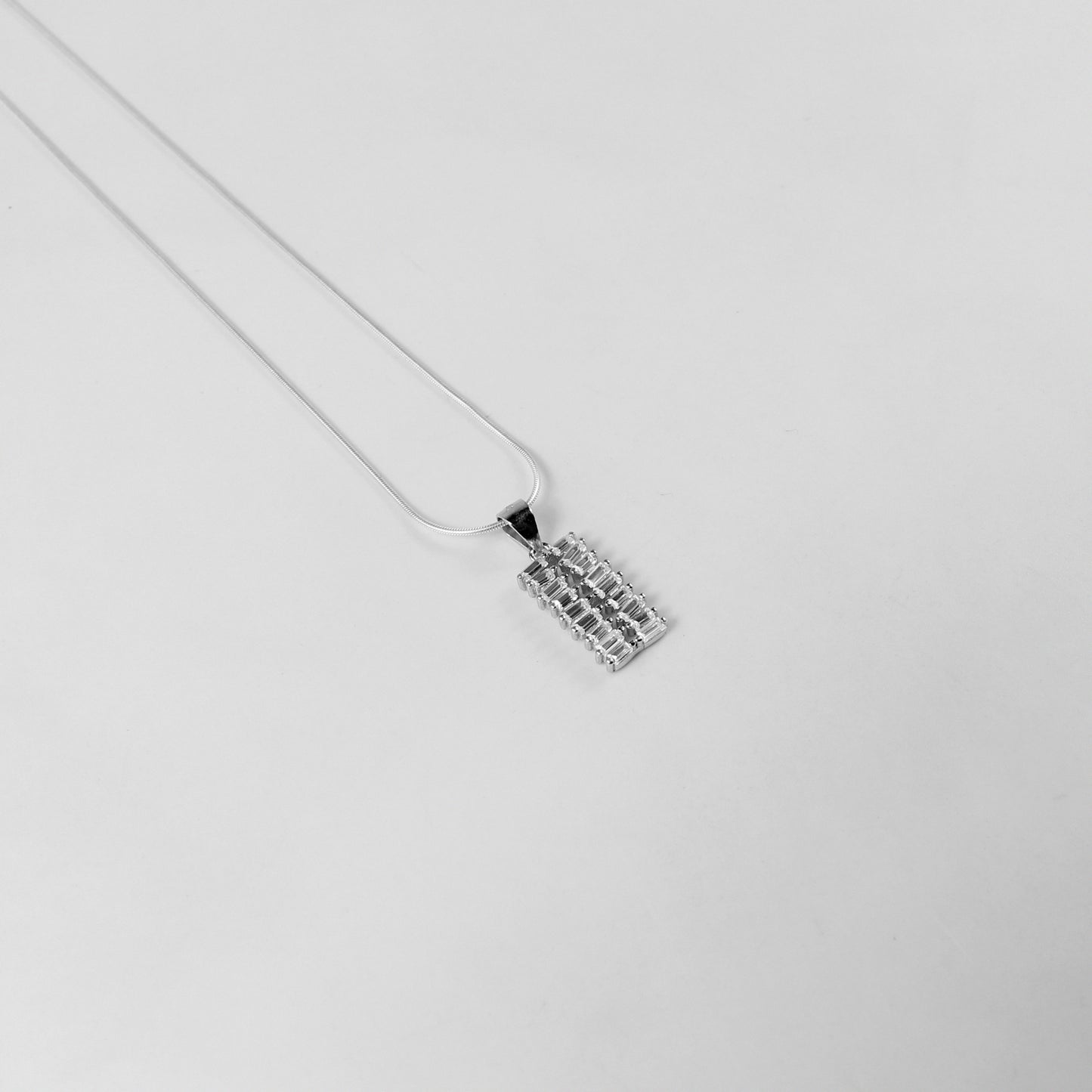 925 sterling silver necklace named 'Terra Luxe,' featuring a sophisticated design inspired by the rich elegance of natural elements. Its refined craftsmanship blends earthly textures with a modern luxurious aesthetic, making it a standout accessory.