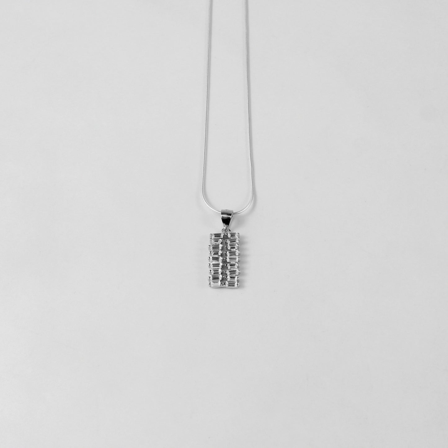 925 sterling silver necklace named 'Terra Luxe,' featuring a sophisticated design inspired by the rich elegance of natural elements. Its refined craftsmanship blends earthly textures with a modern luxurious aesthetic, making it a standout accessory.