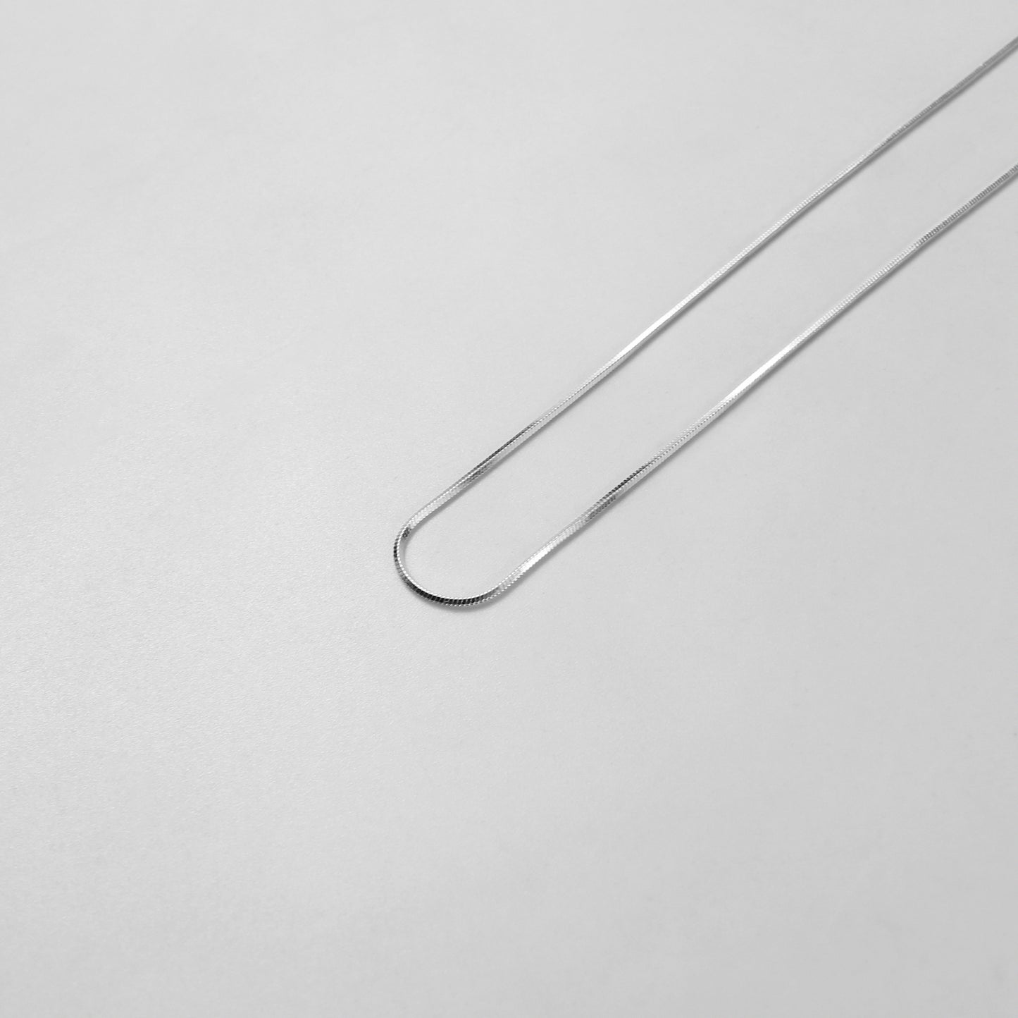 925 sterling silver necklace named 'Thin Radiant Veil,' featuring a refined and delicate design with shimmering accents that emulate the elegance of a flowing, ethereal veil. Its minimalist charm and graceful aesthetic make it a perfect accessory for any occasion.