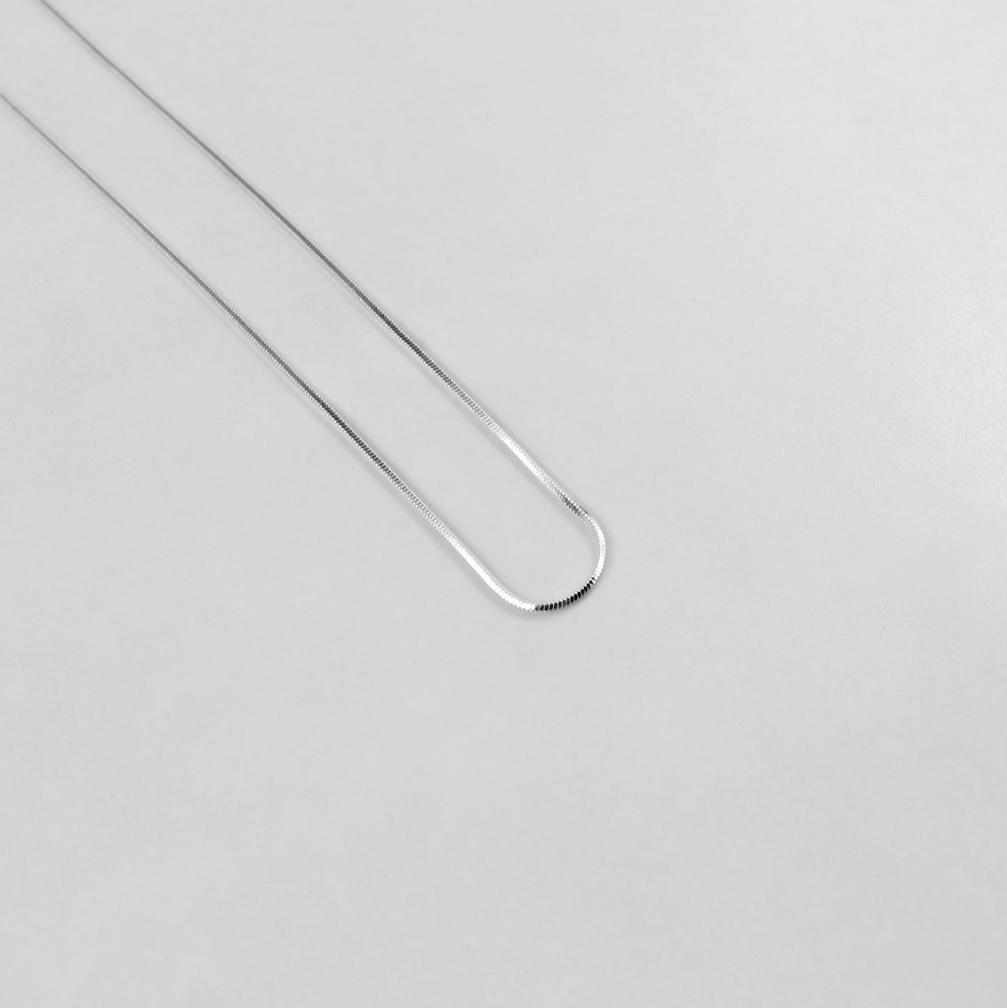 925 sterling silver necklace named 'Thin Radiant Veil,' featuring a refined and delicate design with shimmering accents that emulate the elegance of a flowing, ethereal veil. Its minimalist charm and graceful aesthetic make it a perfect accessory for any occasion.