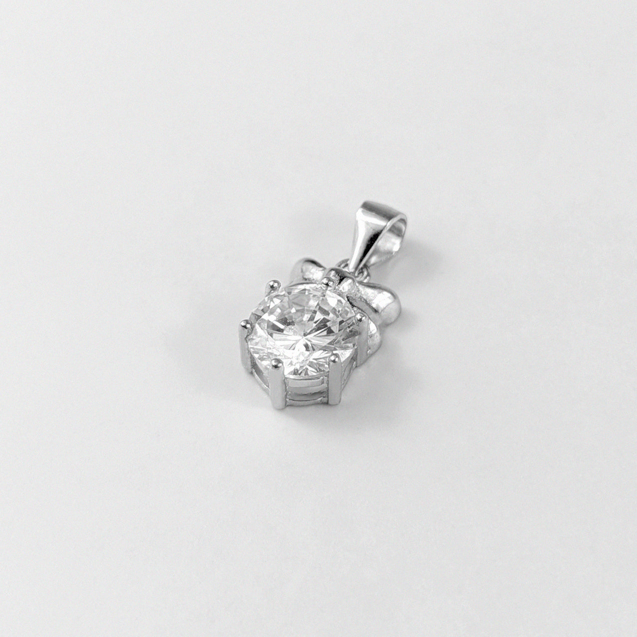 GETTHEJUICE-925STERLINGSILVER-White Veil Necklace: A sterling silver necklace with an ethereal design resembling a delicate veil, offering a timeless and graceful charm.