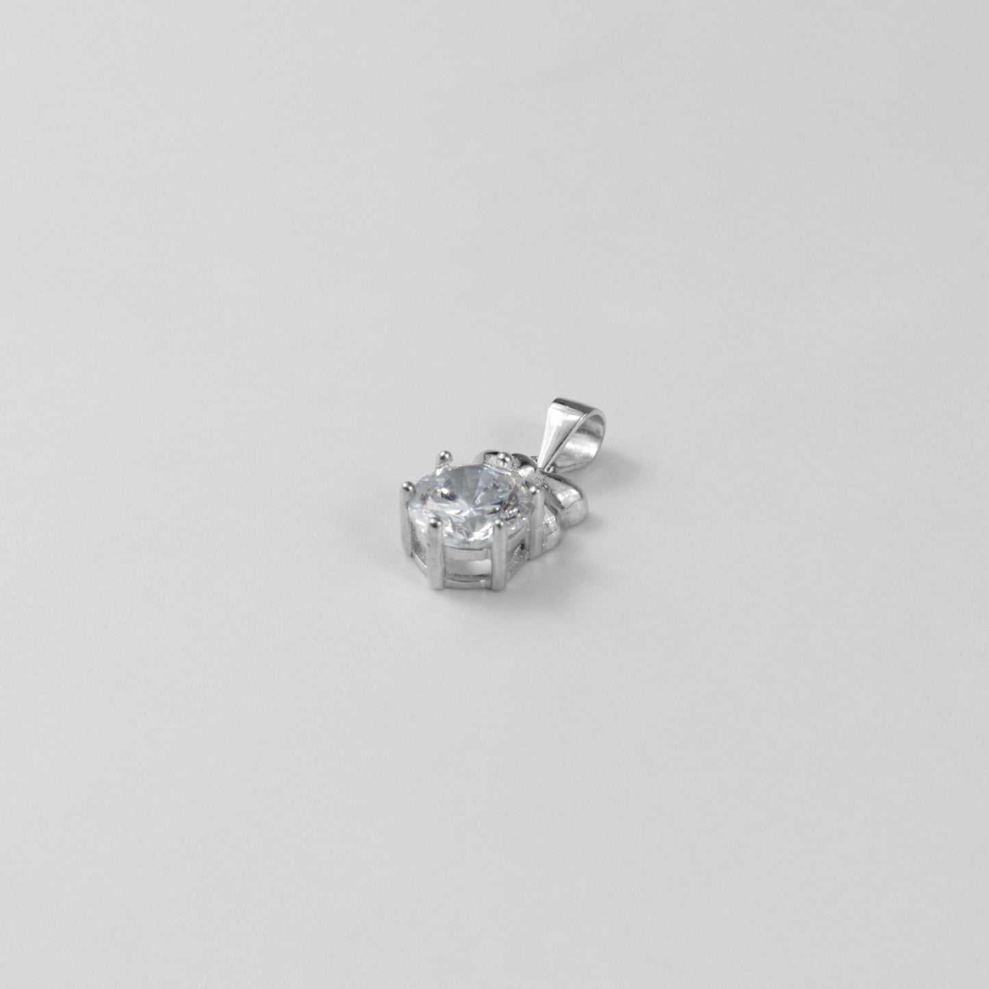 GETTHEJUICE-925STERLINGSILVER-White Veil Necklace: A sterling silver necklace with an ethereal design resembling a delicate veil, offering a timeless and graceful charm.