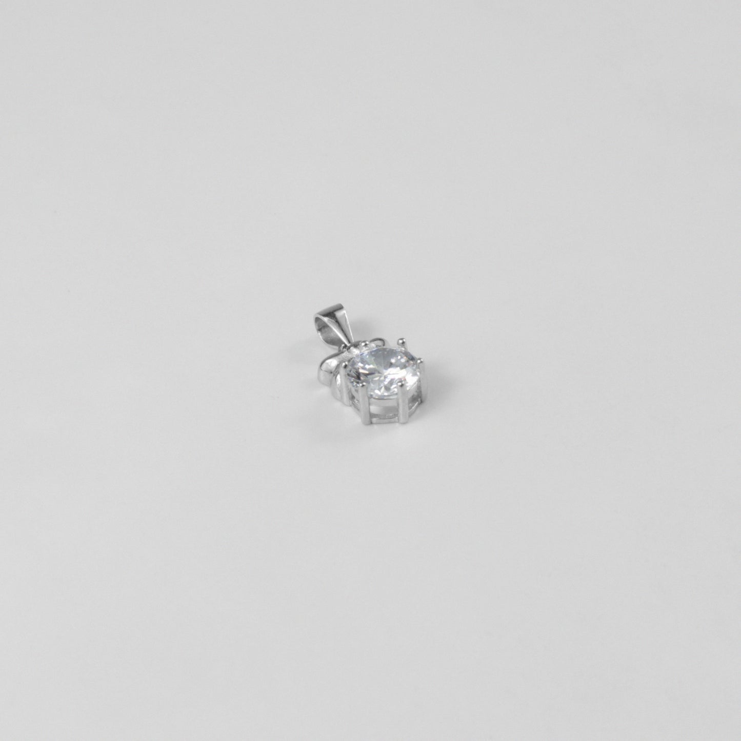 GETTHEJUICE-925STERLINGSILVER-White Veil Necklace: A sterling silver necklace with an ethereal design resembling a delicate veil, offering a timeless and graceful charm.