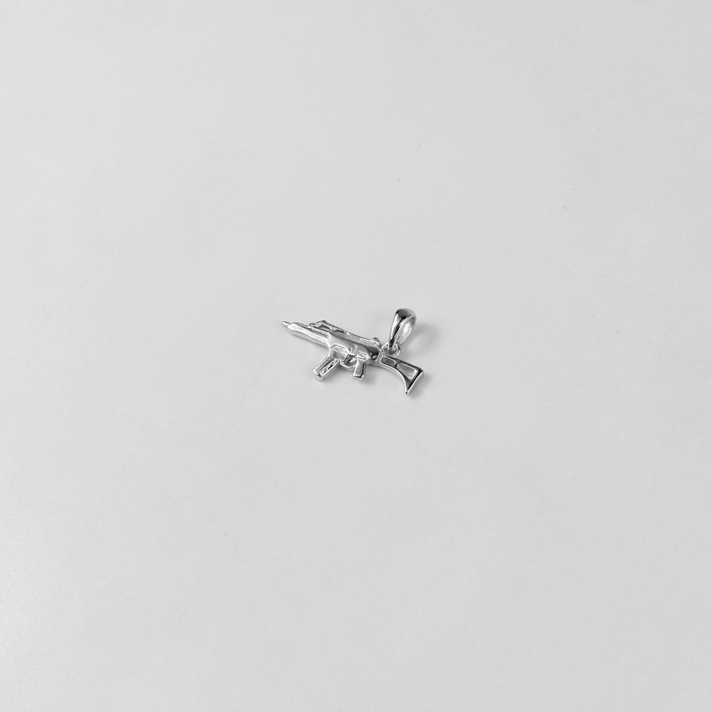 The 'Barrel's Edge' pendant, crafted from 925 sterling silver, featuring a bold barrel-inspired design with sleek edges for a modern aesthetic.