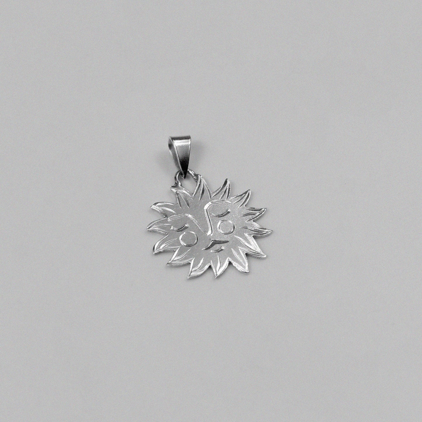 Soleil Pendant - An exquisite 925 sterling silver pendant by GetTheJuice, featuring a radiant sun-inspired design that captures the warmth and brilliance of the sun, adding a touch of luminous elegance to any look.