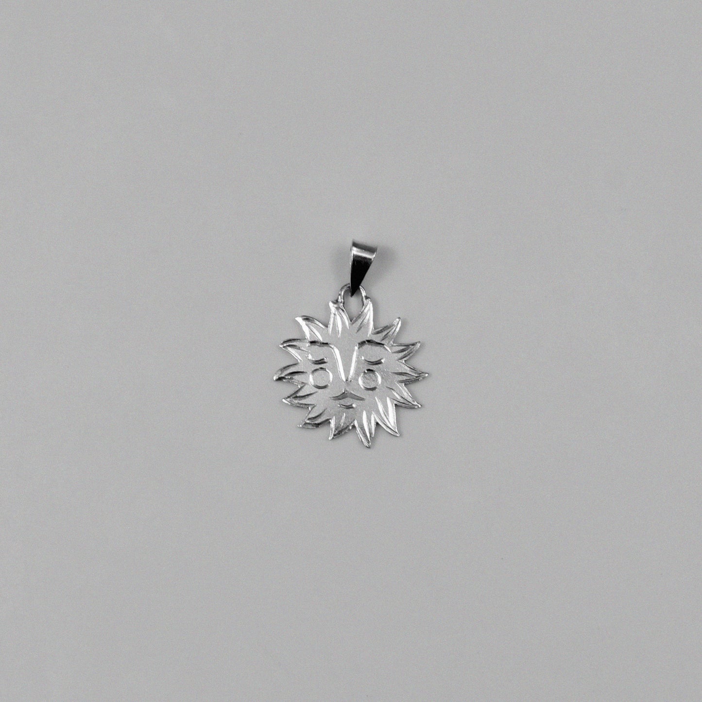 Soleil Pendant - An exquisite 925 sterling silver pendant by GetTheJuice, featuring a radiant sun-inspired design that captures the warmth and brilliance of the sun, adding a touch of luminous elegance to any look.
