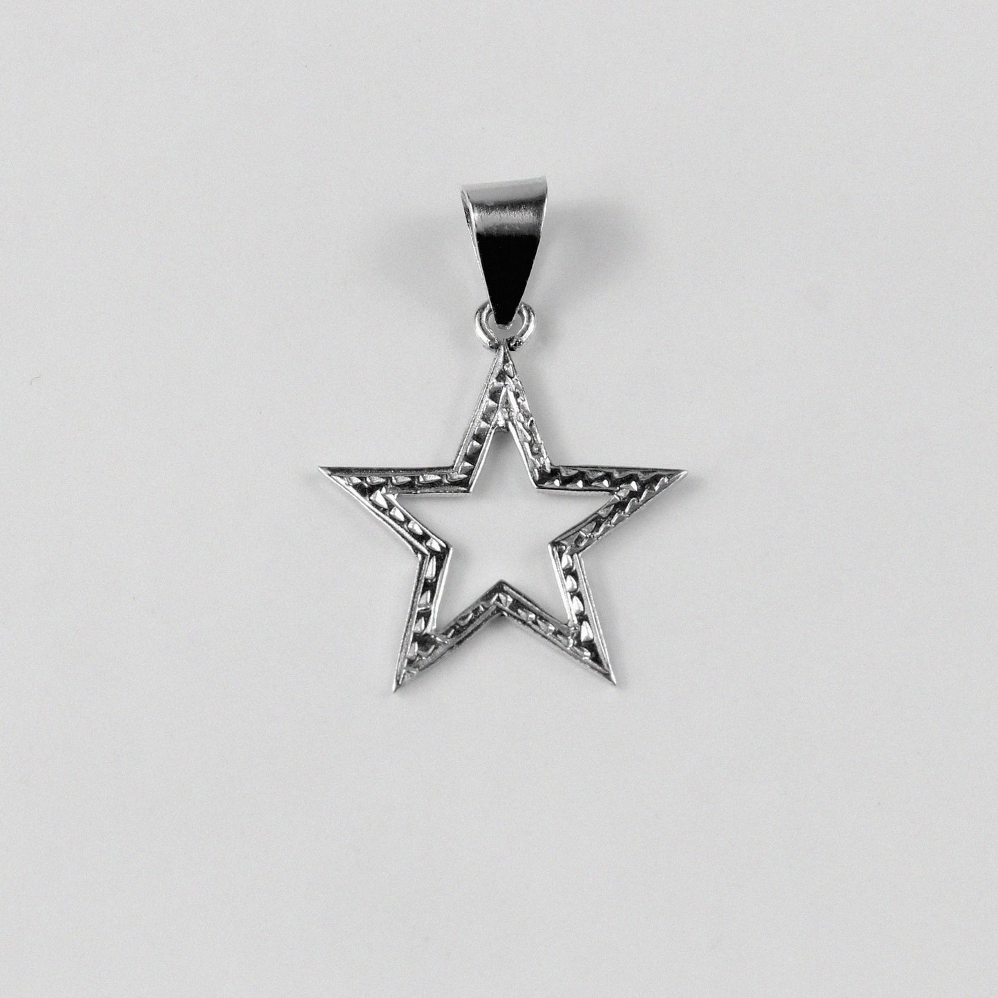 Starlight Pendant - An elegant 925 sterling silver pendant by GetTheJuice, featuring a dazzling star-inspired design that captures the brilliance of the night sky, adding a touch of celestial elegance.