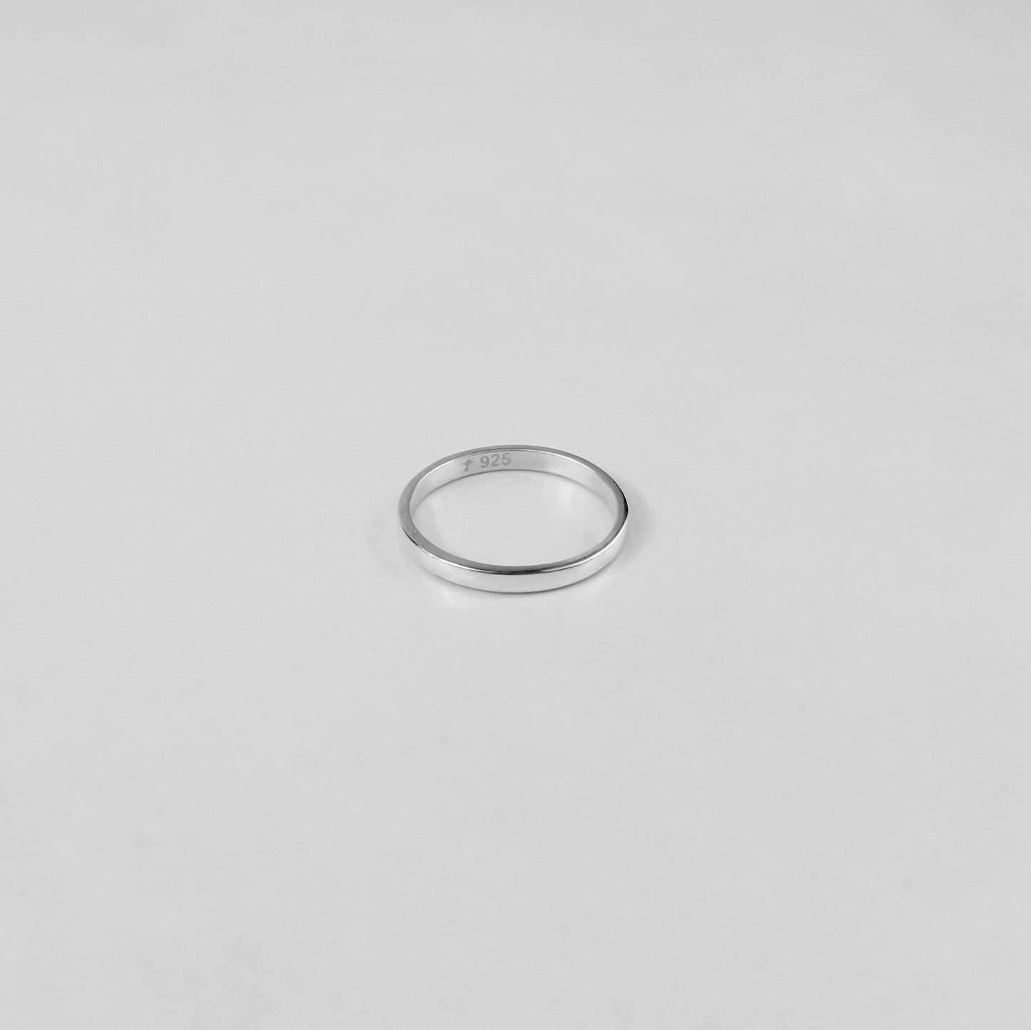 Sterling silver ring stamped '925,' featuring a refined circular design, named 'Circle of Elegance Ring.