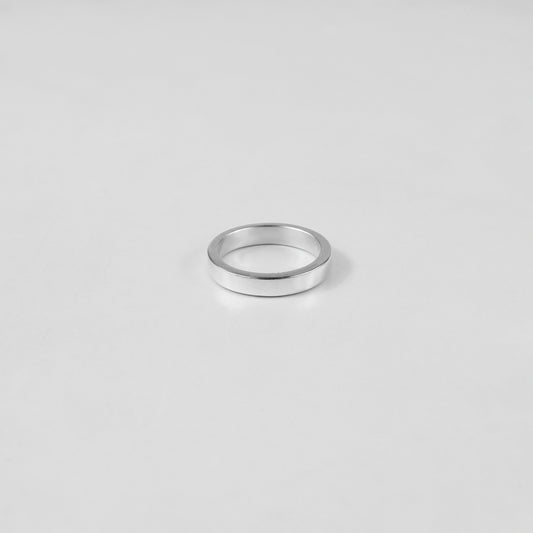 Sterling silver ring stamped '925,' featuring a refined circular design, named 'Circle of Elegance Ring.