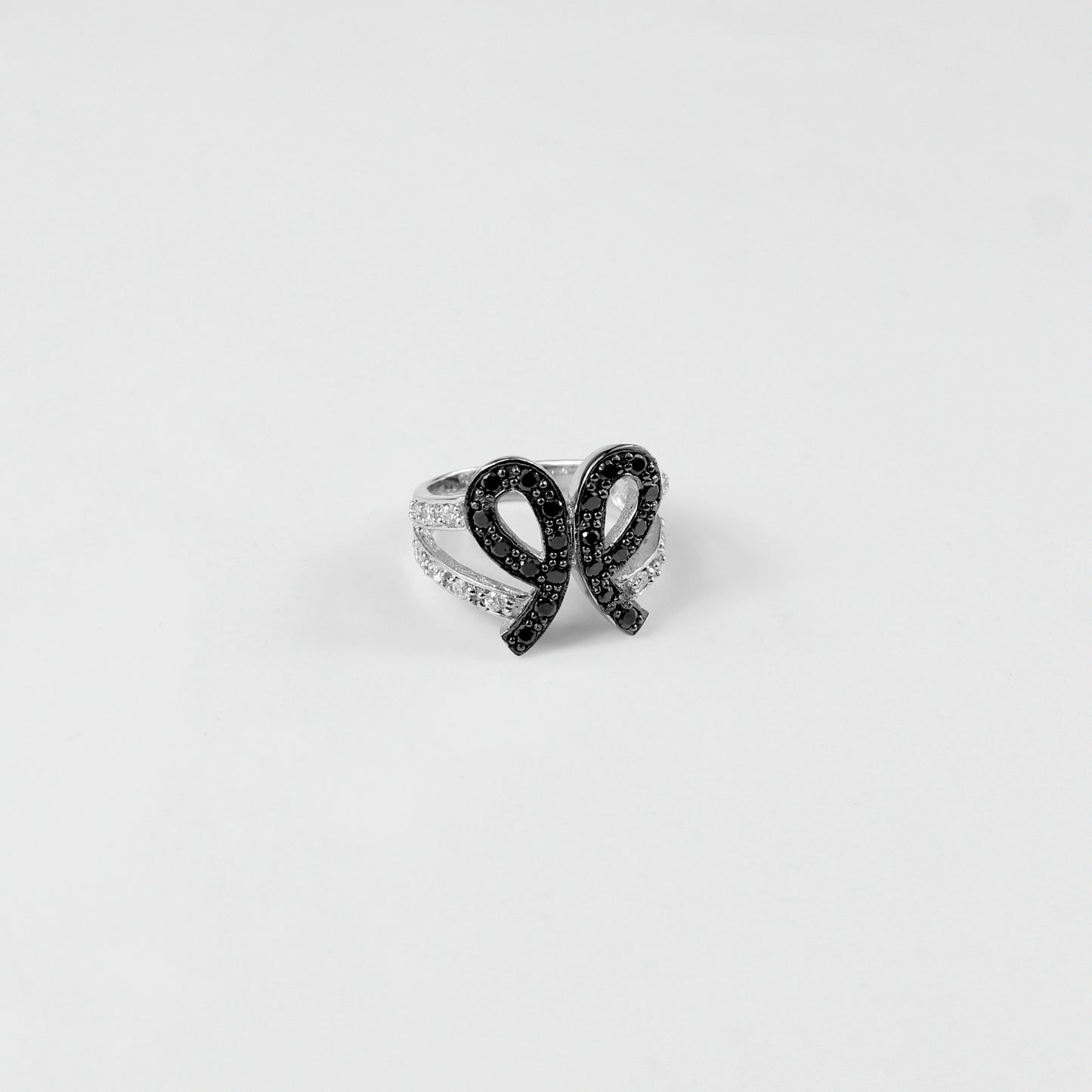 925 sterling silver ring named 'Crystal Dawn,' showcasing a delicate design inspired by the tranquil beauty of the morning light. Its sparkling details evoke the radiance of crystals at sunrise, creating a piece that embodies elegance and renewal.