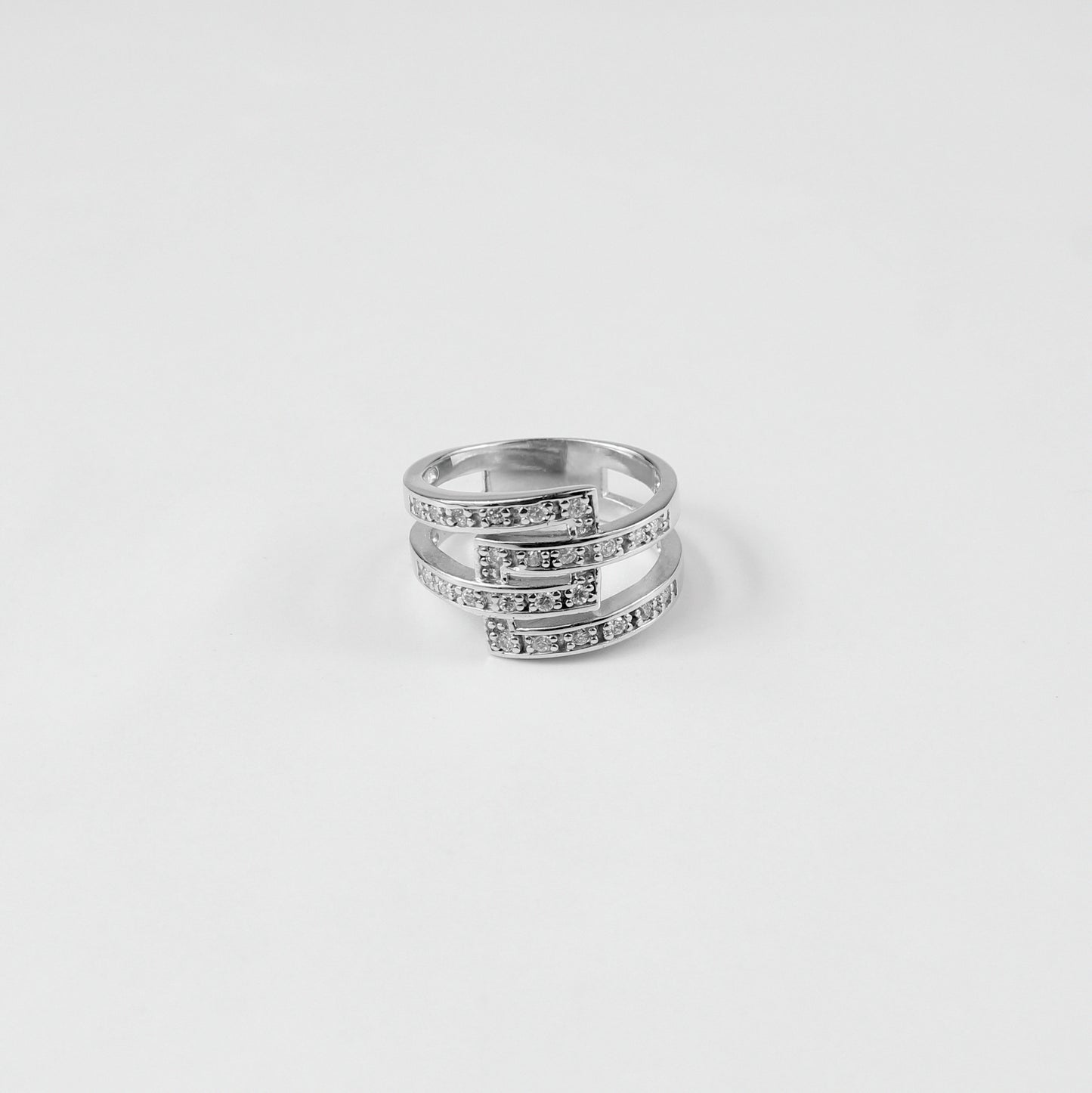 Gleaming Trinity Band Ring crafted from 925 sterling silver, showcasing a sleek three-band design that exudes modern elegance.