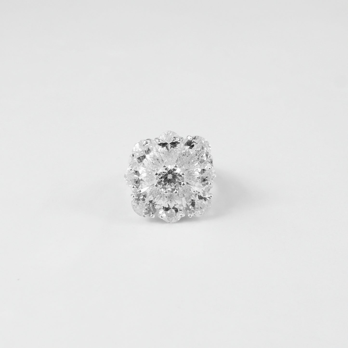 925 sterling silver ring named 'Ivory Spark,' featuring a luminous design inspired by the gentle brilliance of ivory tones. Its delicate sparkle and graceful craftsmanship exude refined charm, making it an elegant addition to any collection.