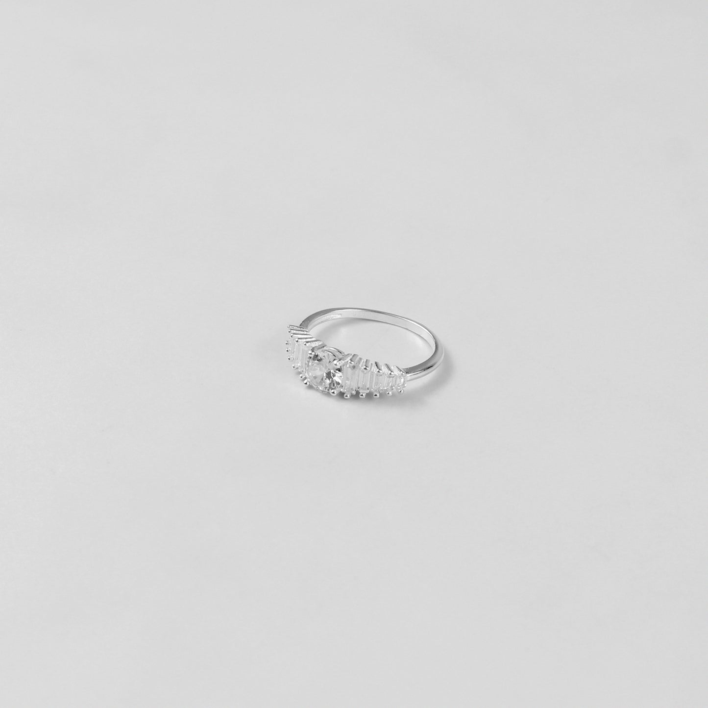 Lustre Crown Ring crafted from 925 sterling silver, featuring a regal and elegant design inspired by timeless beauty.