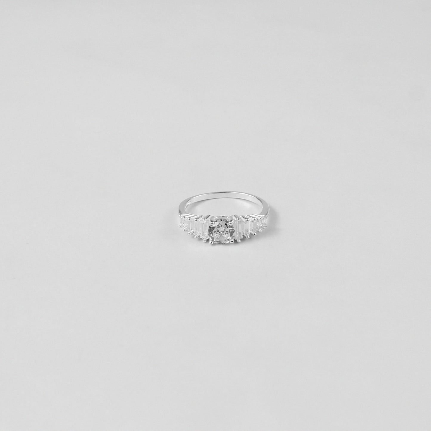 Lustre Crown Ring crafted from 925 sterling silver, featuring a regal and elegant design inspired by timeless beauty.