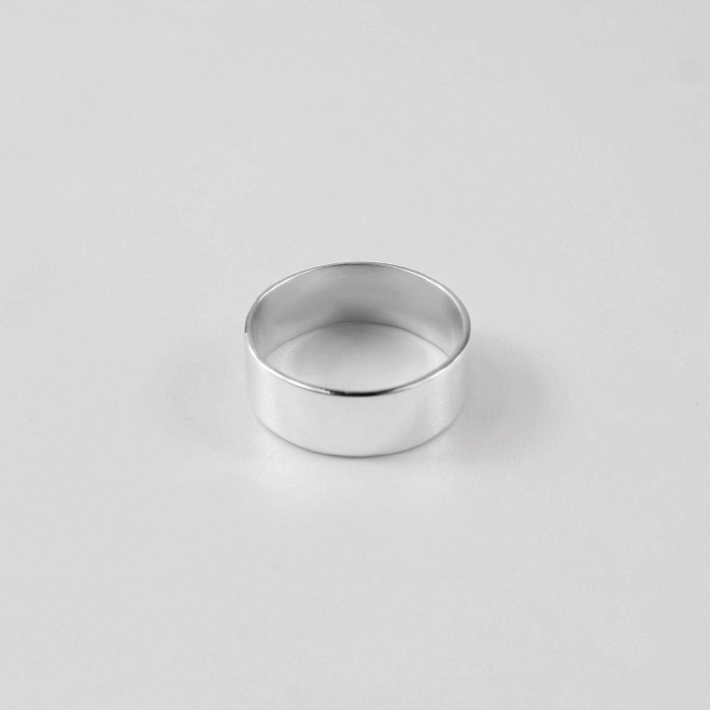 "925 sterling silver ring featuring a circular design with intricate details, named 'Nebula Circle Ring.'"