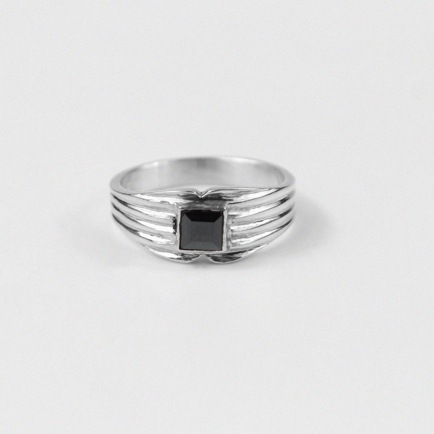 "925 sterling silver ring featuring a sleek black onyx gemstone, named 'Onyx Ring.'"