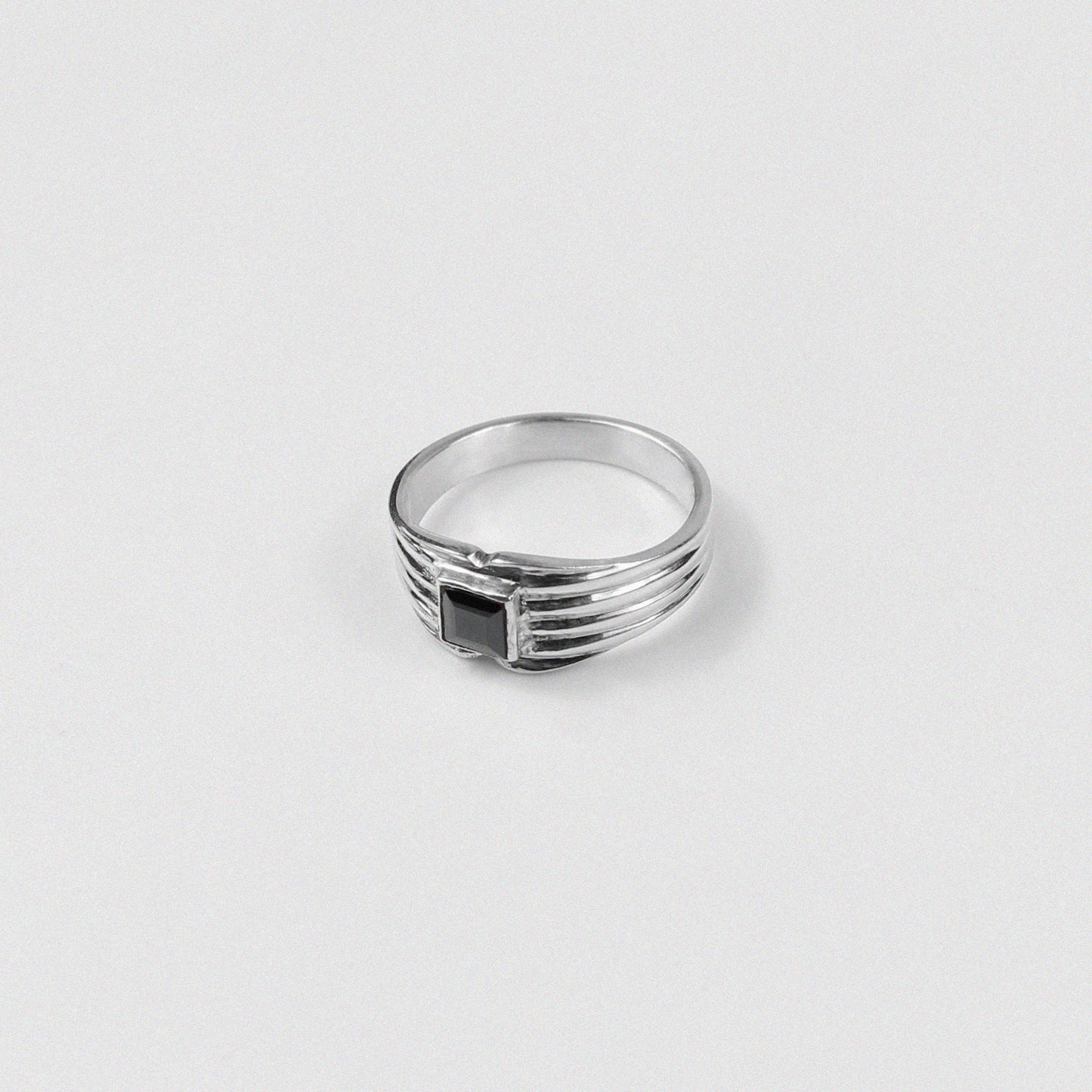 "925 sterling silver ring featuring a sleek black onyx gemstone, named 'Onyx Ring.'"