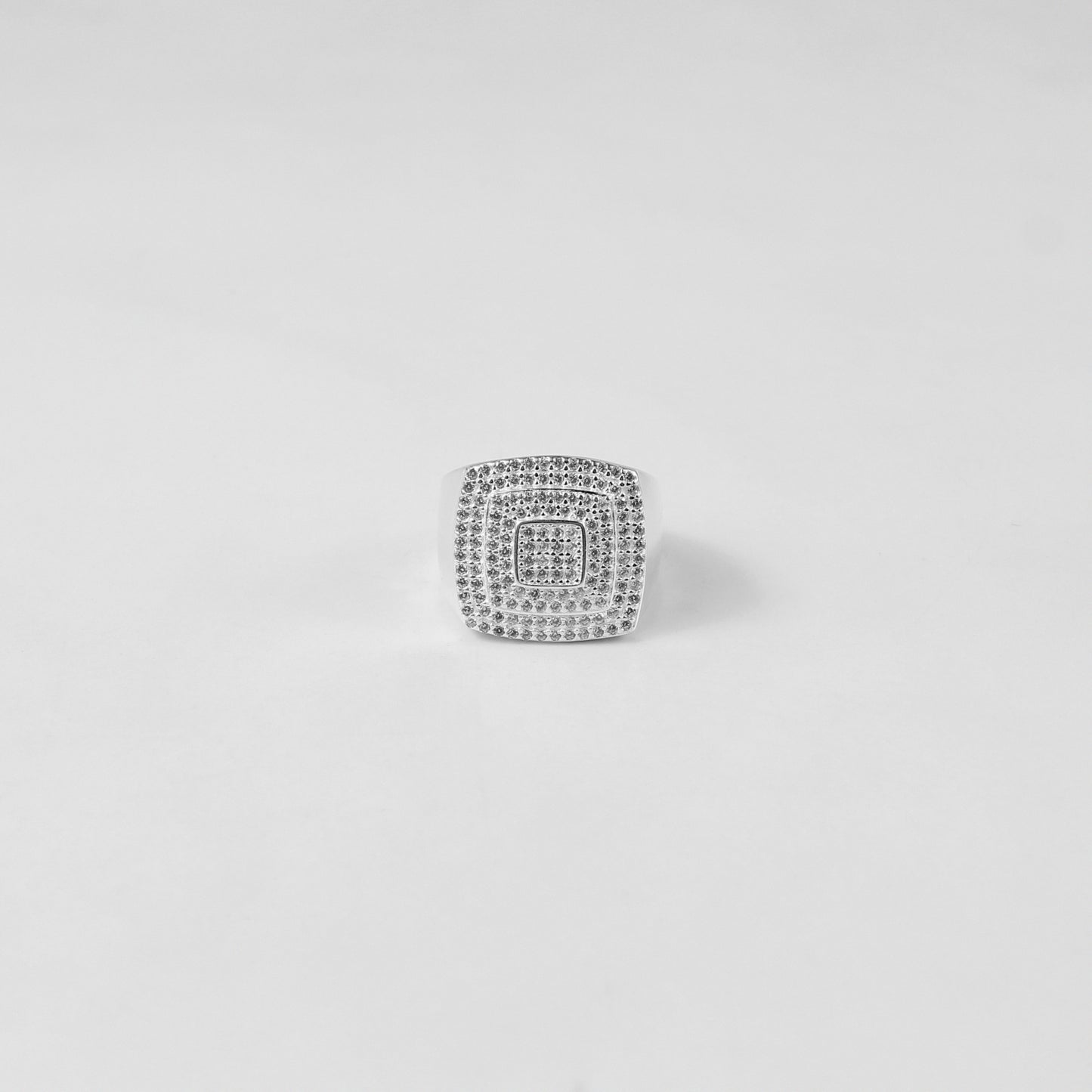 A dazzling sterling silver ring named 'Polar Prism,' featuring sleek, angular details that evoke the beauty of icy geometric patterns. A striking blend of modern elegance and timeless sophistication.