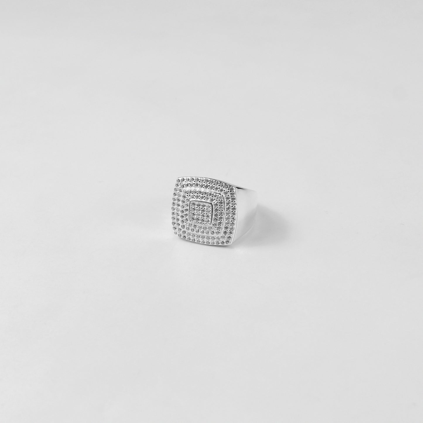 A dazzling sterling silver ring named 'Polar Prism,' featuring sleek, angular details that evoke the beauty of icy geometric patterns. A striking blend of modern elegance and timeless sophistication.