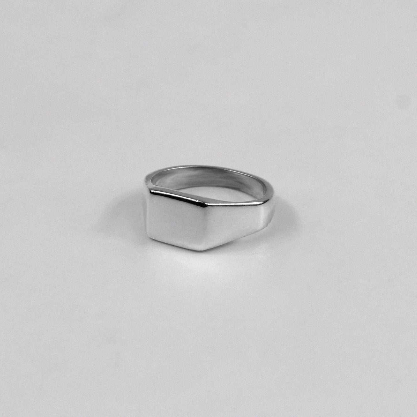 "925 sterling silver band ring showcasing sharp, clean lines with a precision-cut finish, named 'Precision Cut Band Ring.'"