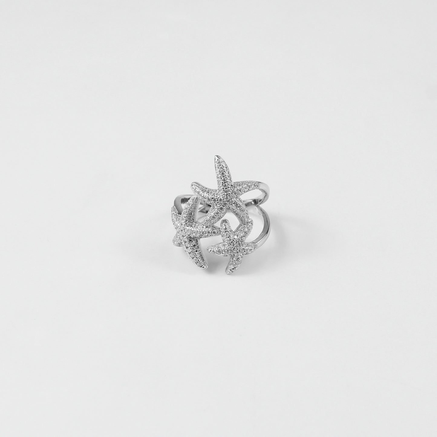 "925 sterling silver 'Starry Whisper' ring, featuring intricate designs inspired by twinkling stars. The gentle shine and serene aesthetic make it a perfect symbol of refined sophistication.