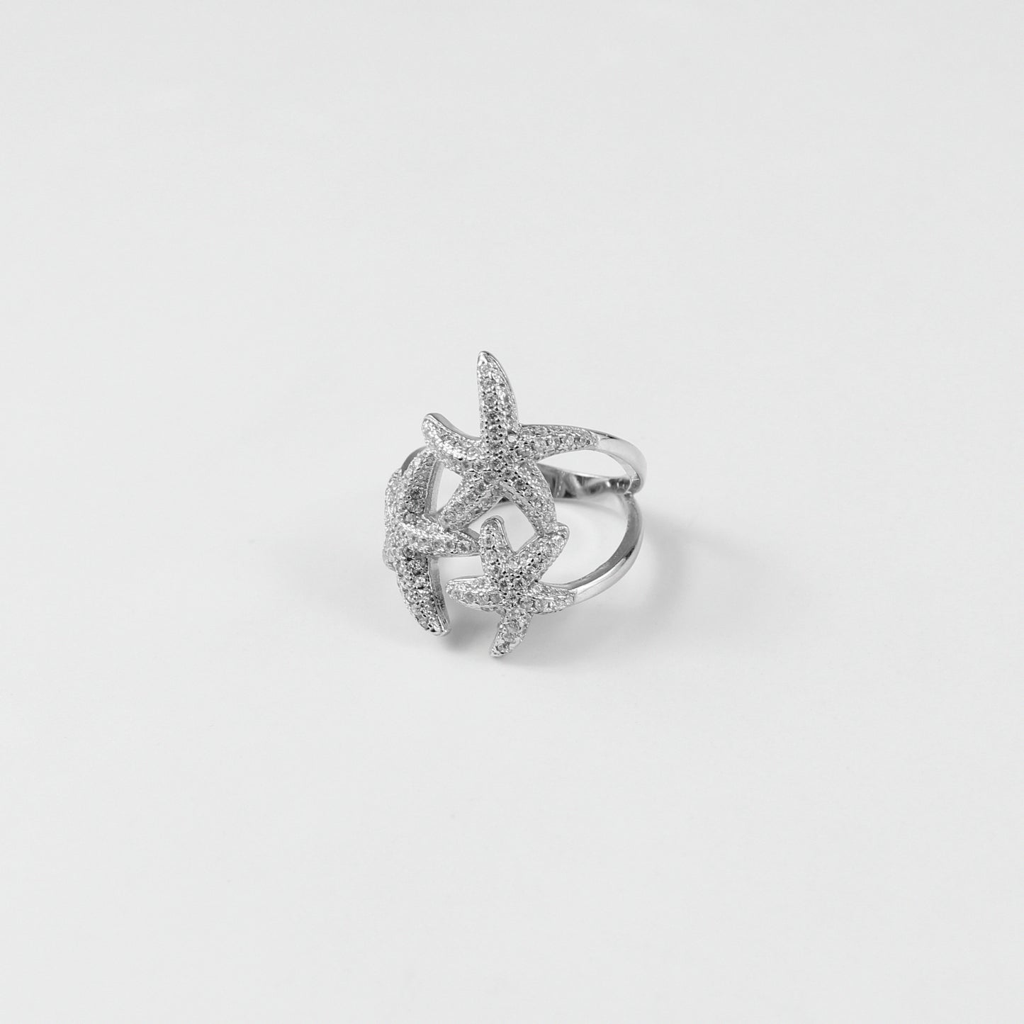 "925 sterling silver 'Starry Whisper' ring, featuring intricate designs inspired by twinkling stars. The gentle shine and serene aesthetic make it a perfect symbol of refined sophistication.