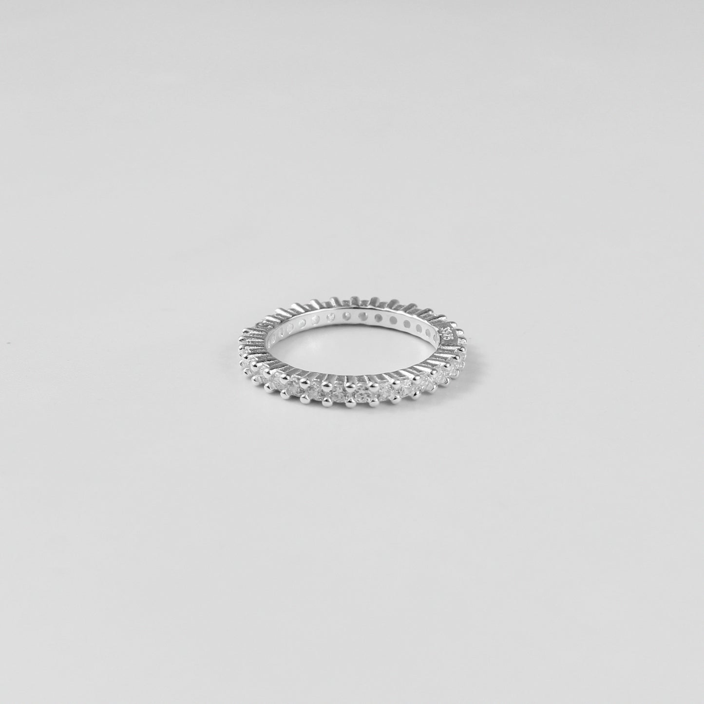 A stunning Stellar Arc Ring made with high-quality 925 sterling silver, embodying the elegance of celestial curves. Its understated charm and radiant silver finish make it a versatile addition to any jewelry collection.