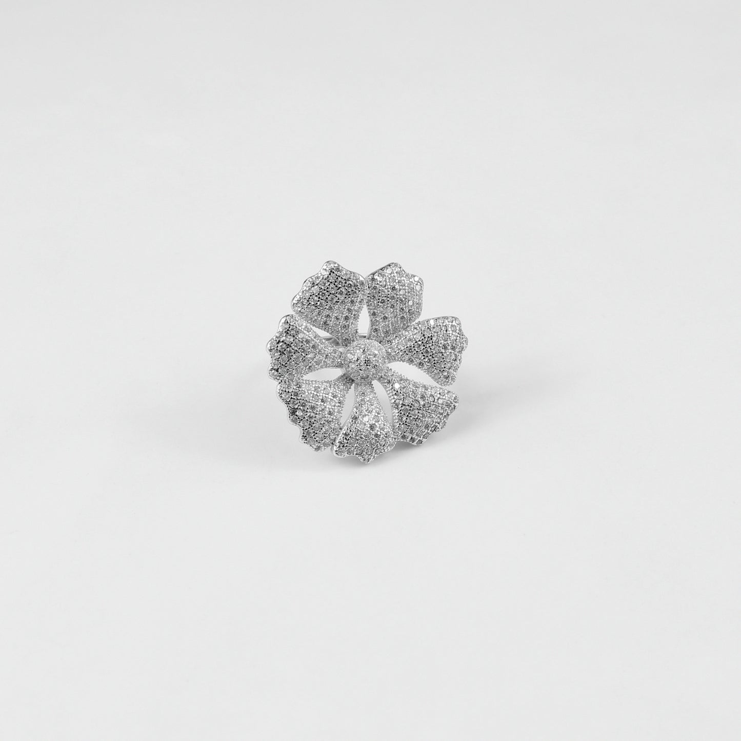 925 sterling silver ring named 'Sterling Floral Dazzle,' featuring intricate floral motifs embellished with dazzling accents. Its exquisite design captures the delicate beauty of nature, paired with a touch of radiant elegance, perfect for a sophisticated look.