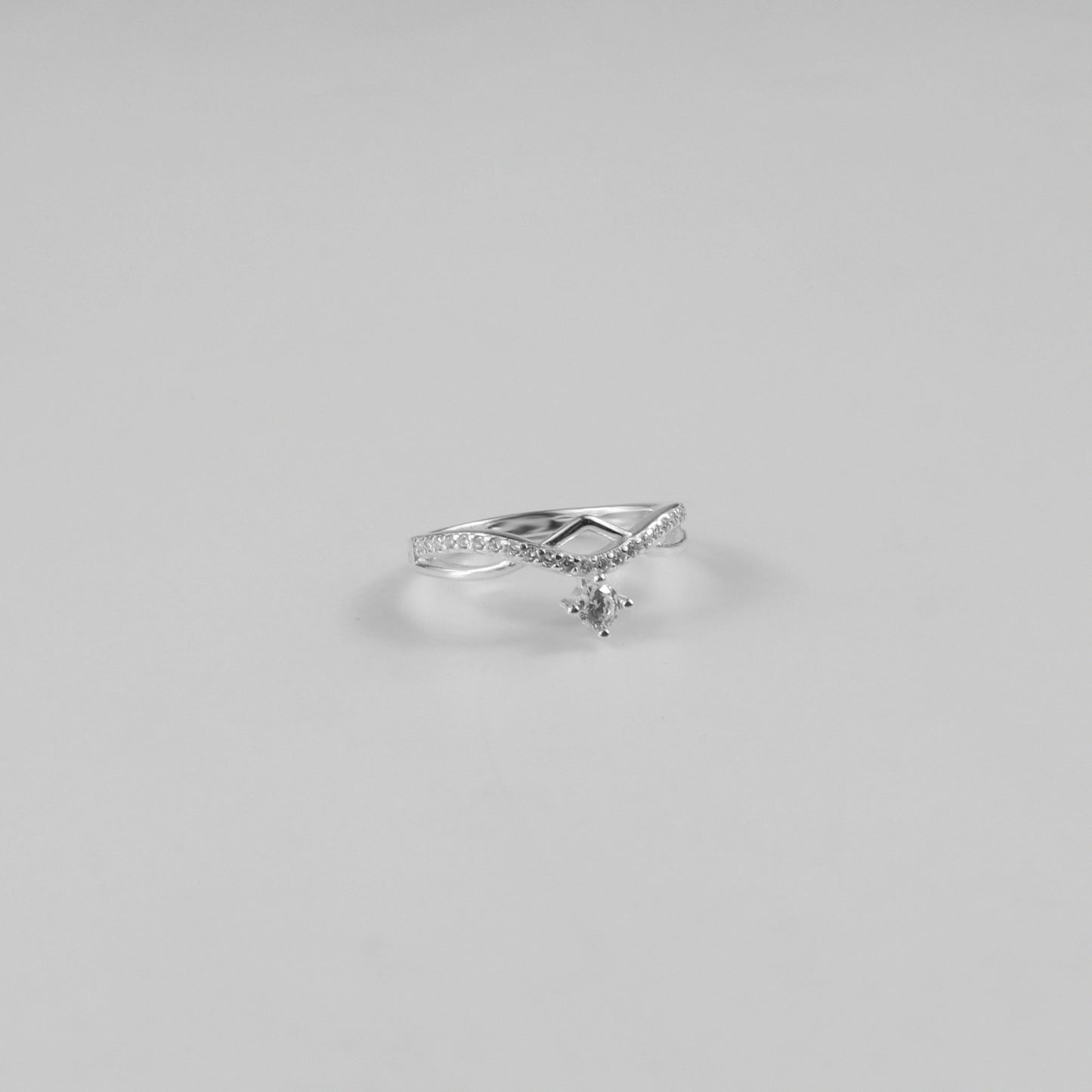 Curved Dangle Solitaire Ring