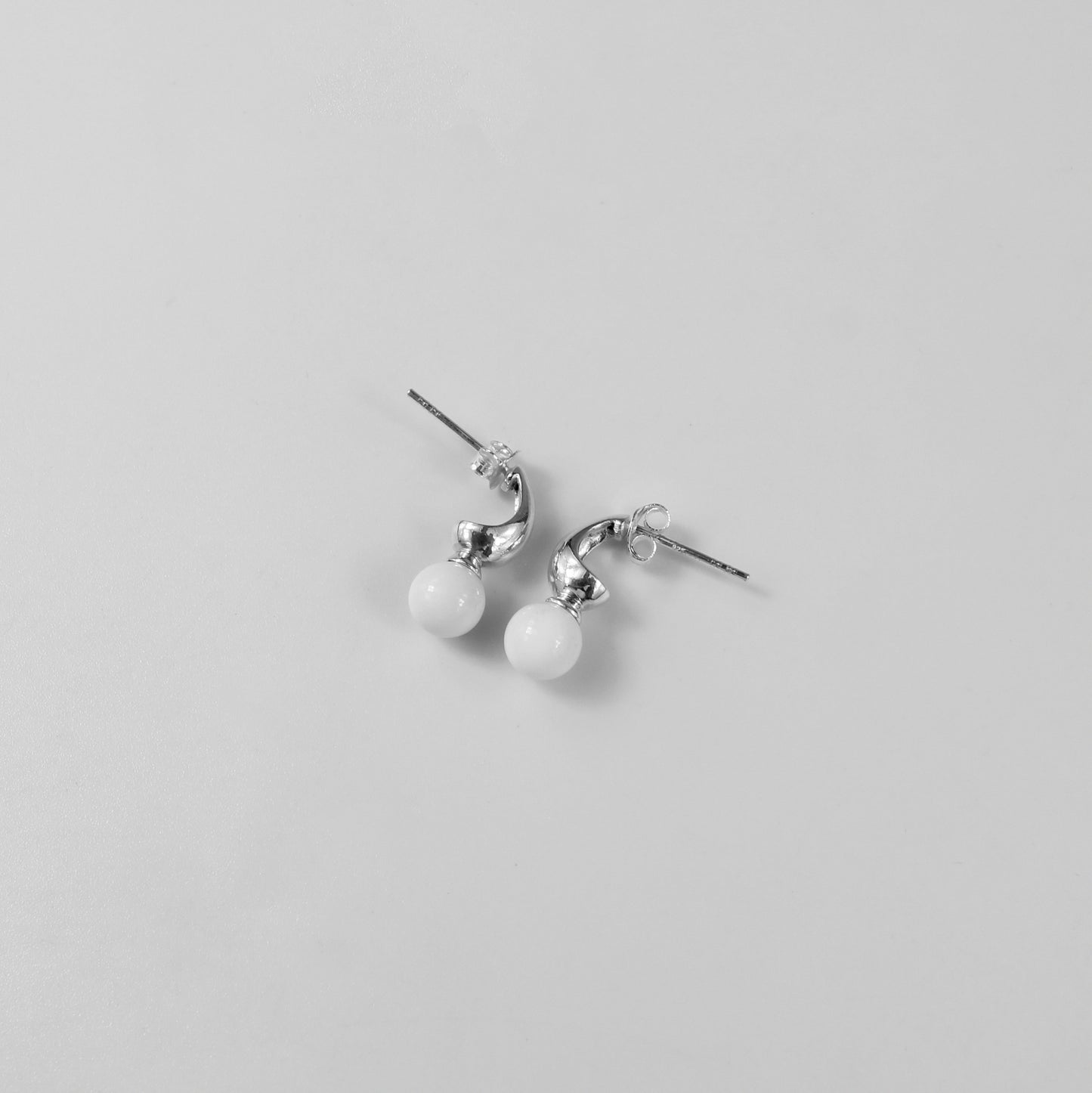 Lustrous white orb Ear Studs